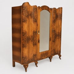 Somptueuse armoire-bibliothèque de style néo-baroque en ronce de noyer, signée Palazzi dell'Arte