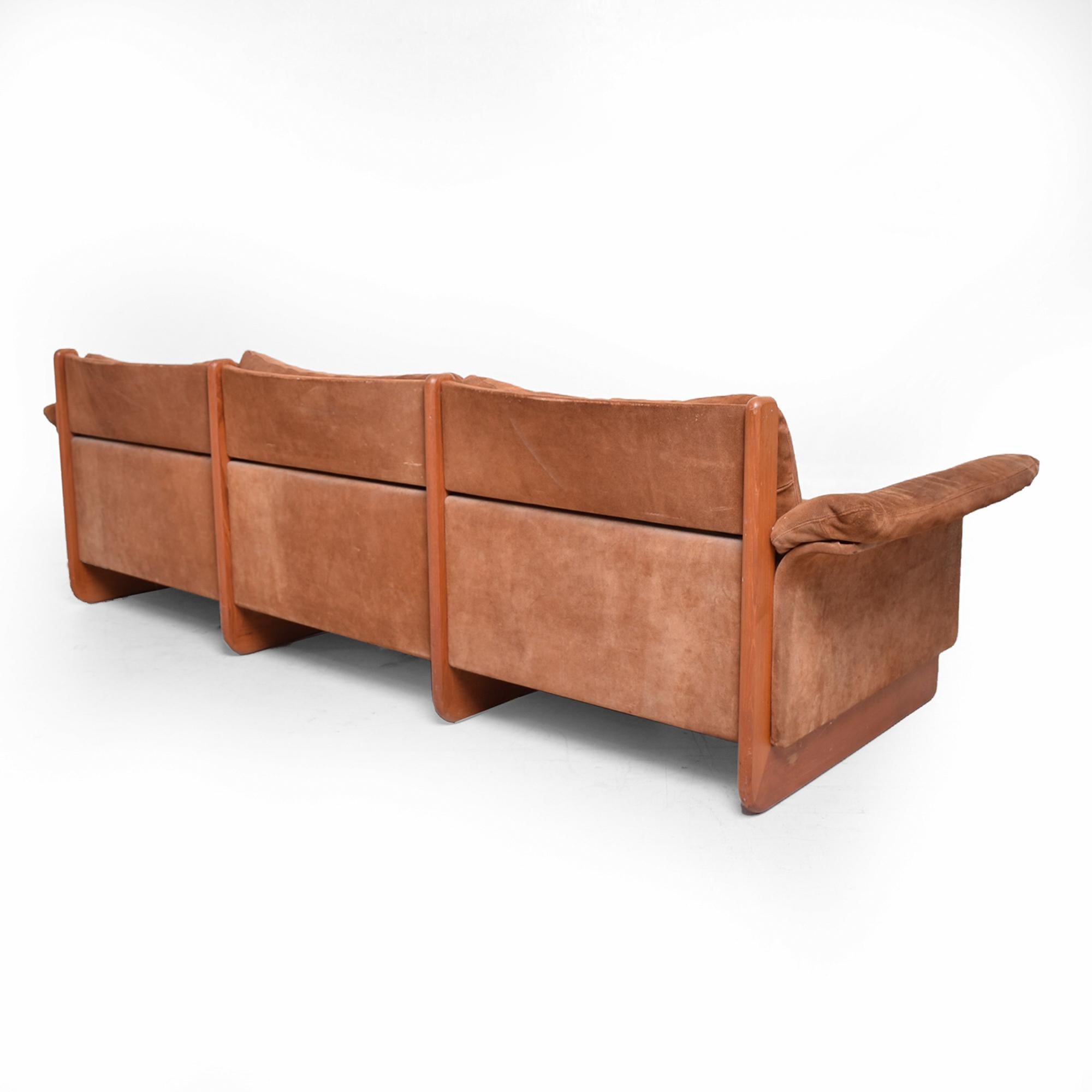 1960s Sharp Scandinavian modern sofa in floating cocoa brown suede with teak wood frame accent.
Stamped made in Denmark JEKI MOBLERFABRIK
Attributed to Ebbe Gehl & Soren Nissen
Measures:25 1/2