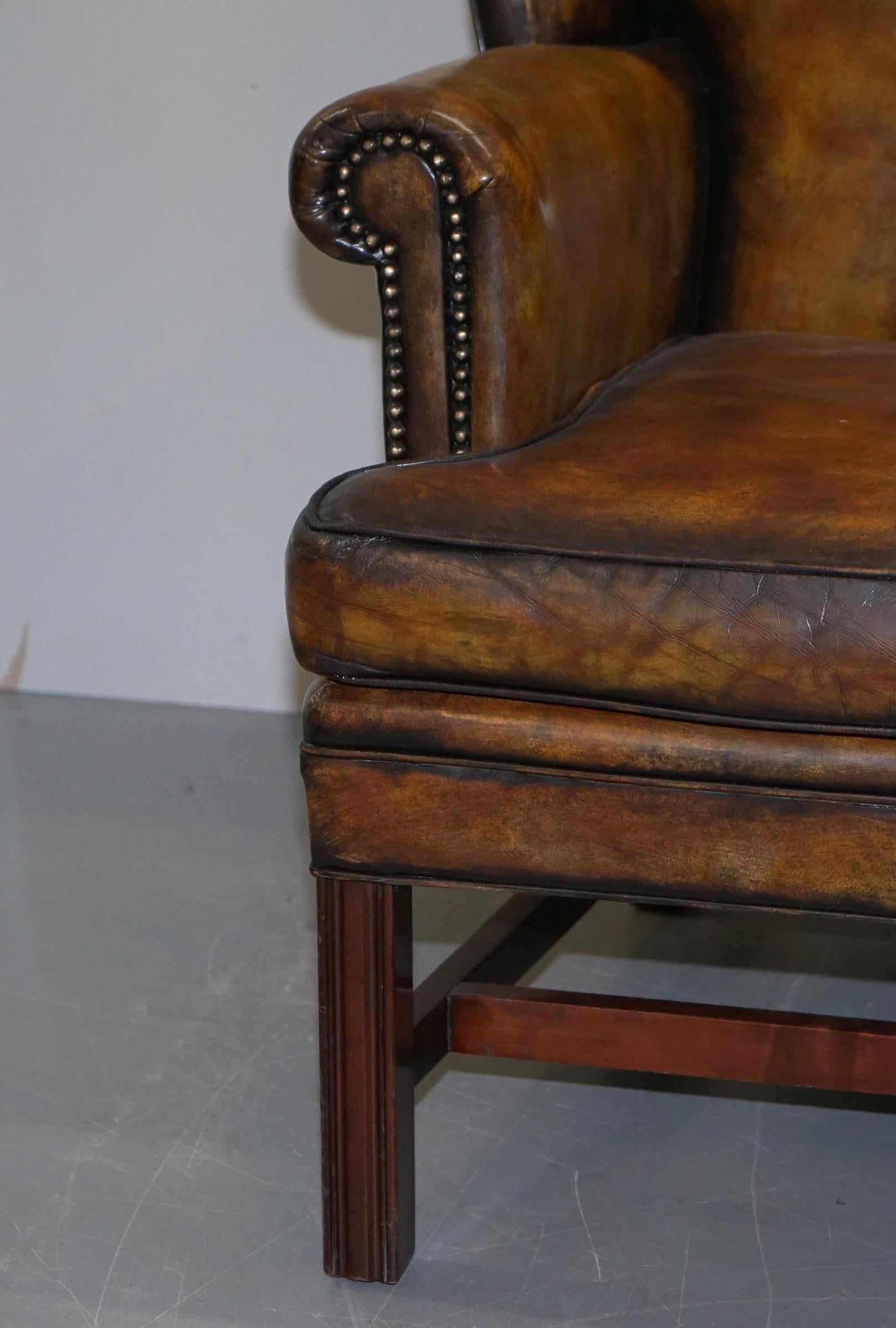 20th Century Sumptuous Pair of Fully Restored Hand Dye Cigar Brown Leather Wingback Armchairs
