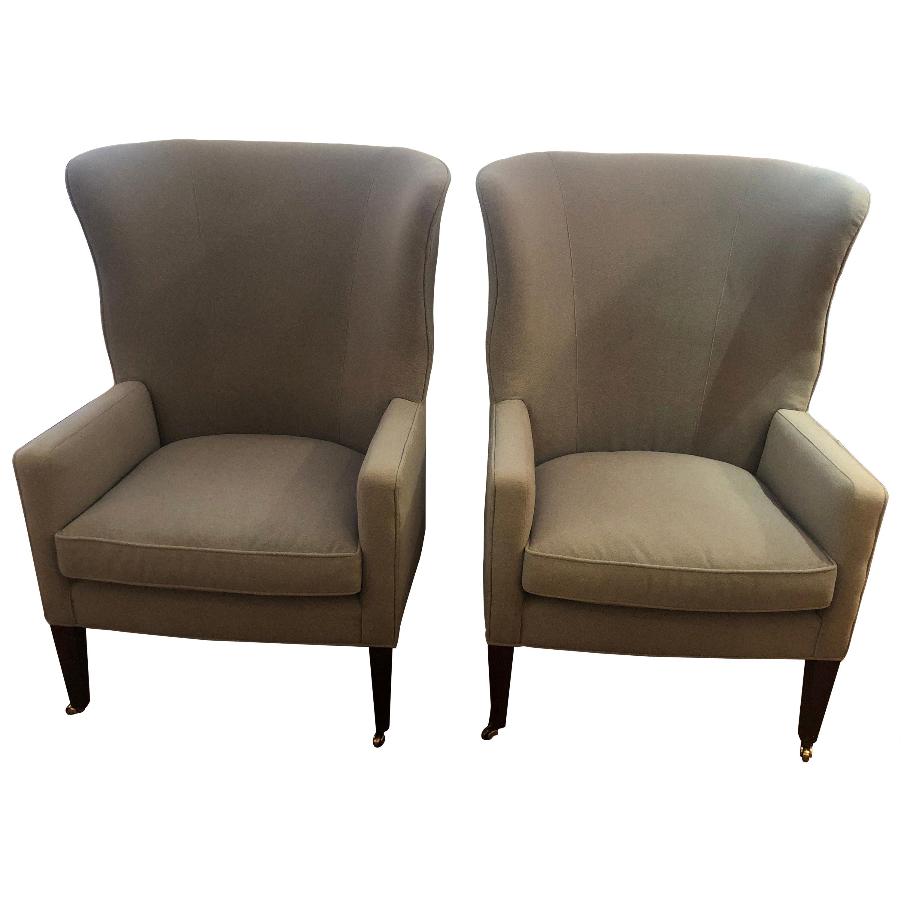 Sumptuous Pair of Grey Flannel Upholstered Barrel Back Wing Chairs