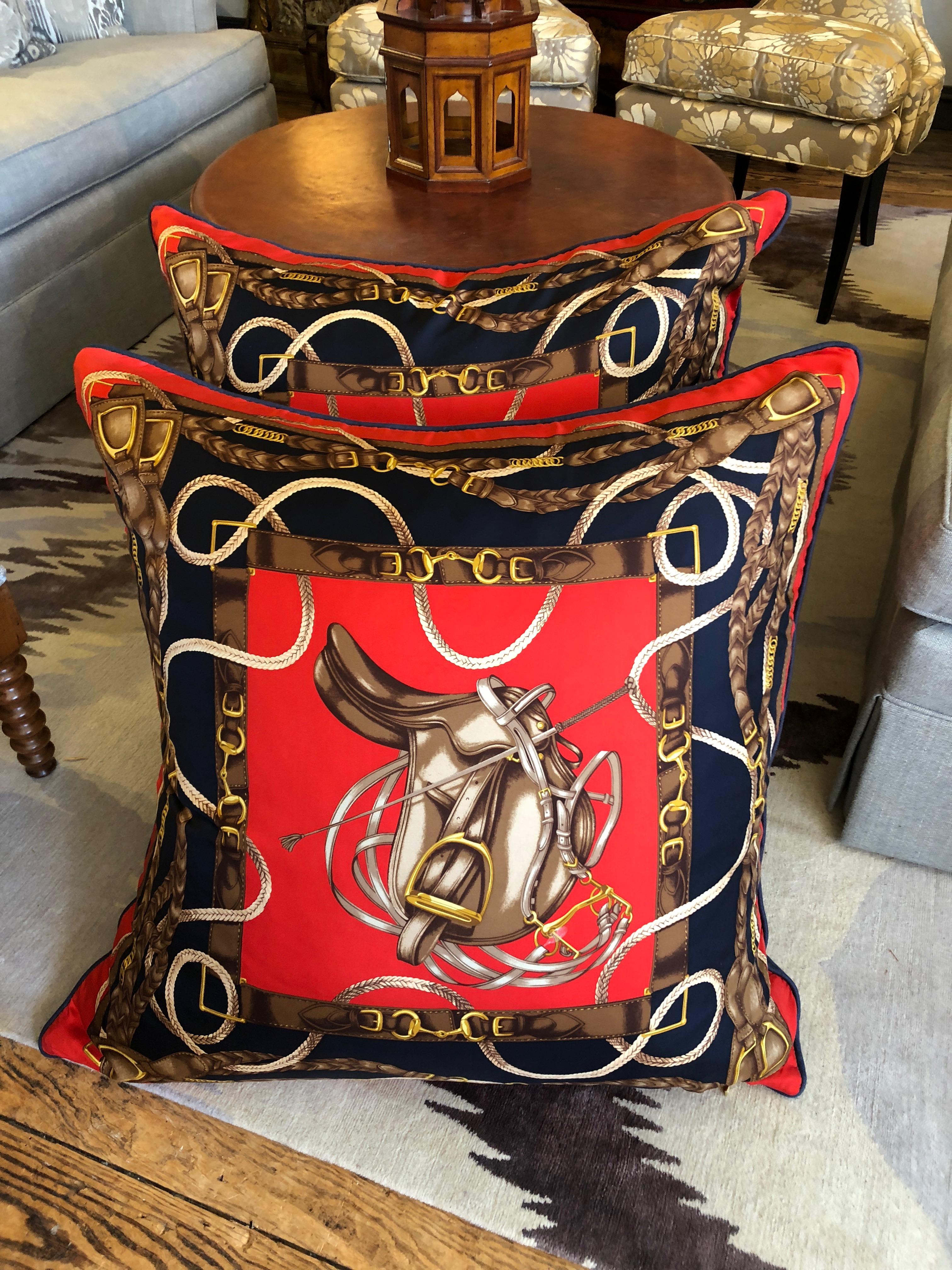 A set of very handsome Ralph Lauren pillows, two are very large and two are average throw pillow size. The design is Classic horse saddle in red, gold and navy blue.
Measures: Small 16.5 H, 17 W, 5 D.
