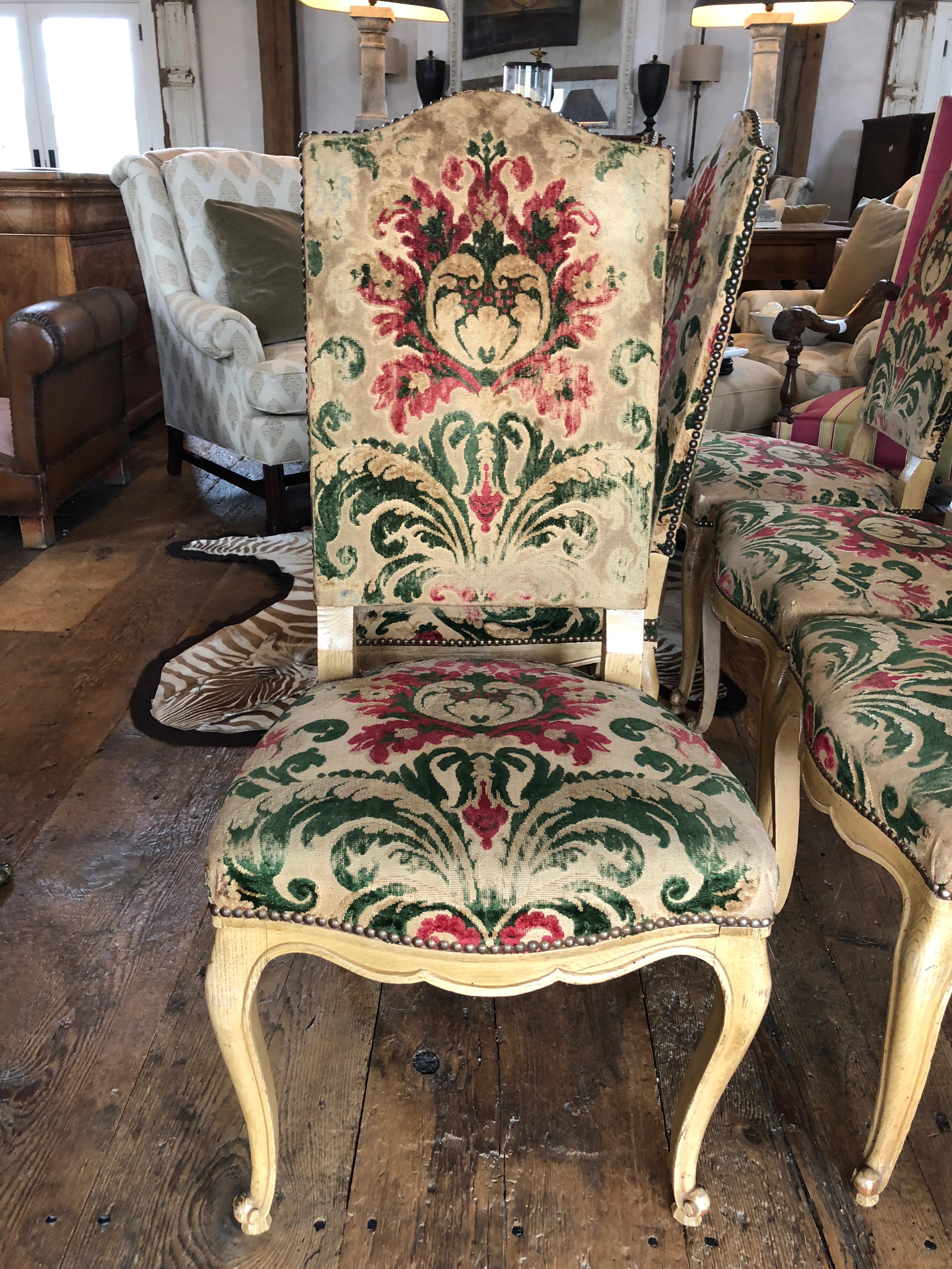 A sumptuous set of six bleached oak and cut velvet Louis XV French chairs with original fabric and paint. Very elegant as well as comfortable. #5004
Measures: Seat depth 18.5.