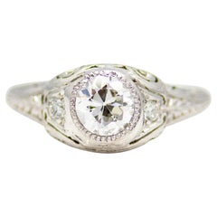 Antique Sumptuously Engraved Art Deco Diamond Engagement Ring in Platinum