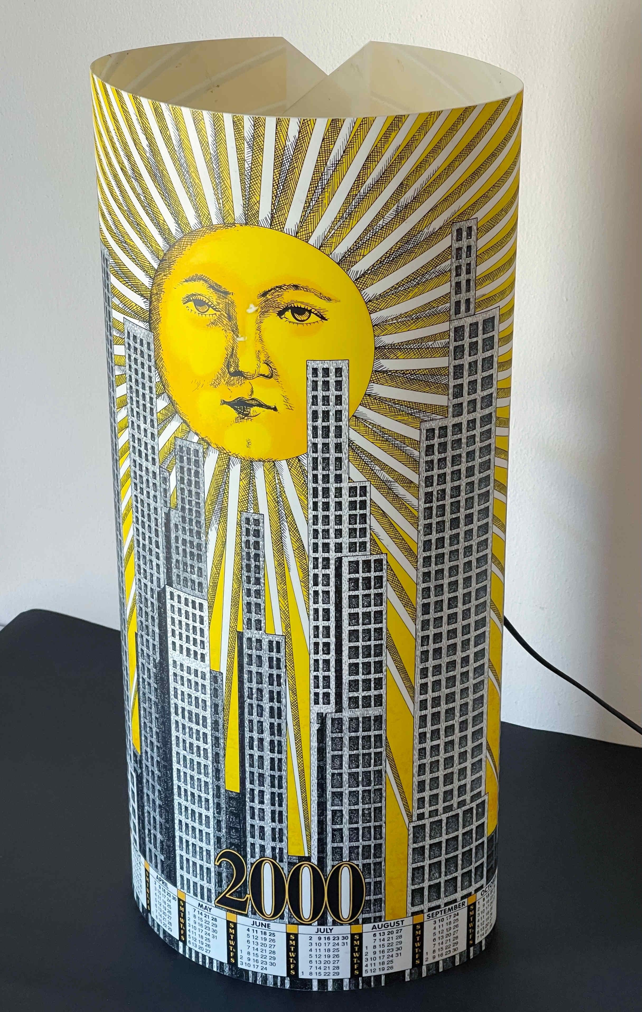 Vintage table lamp composed of a flat plexiglass sheet photostatic printed with 