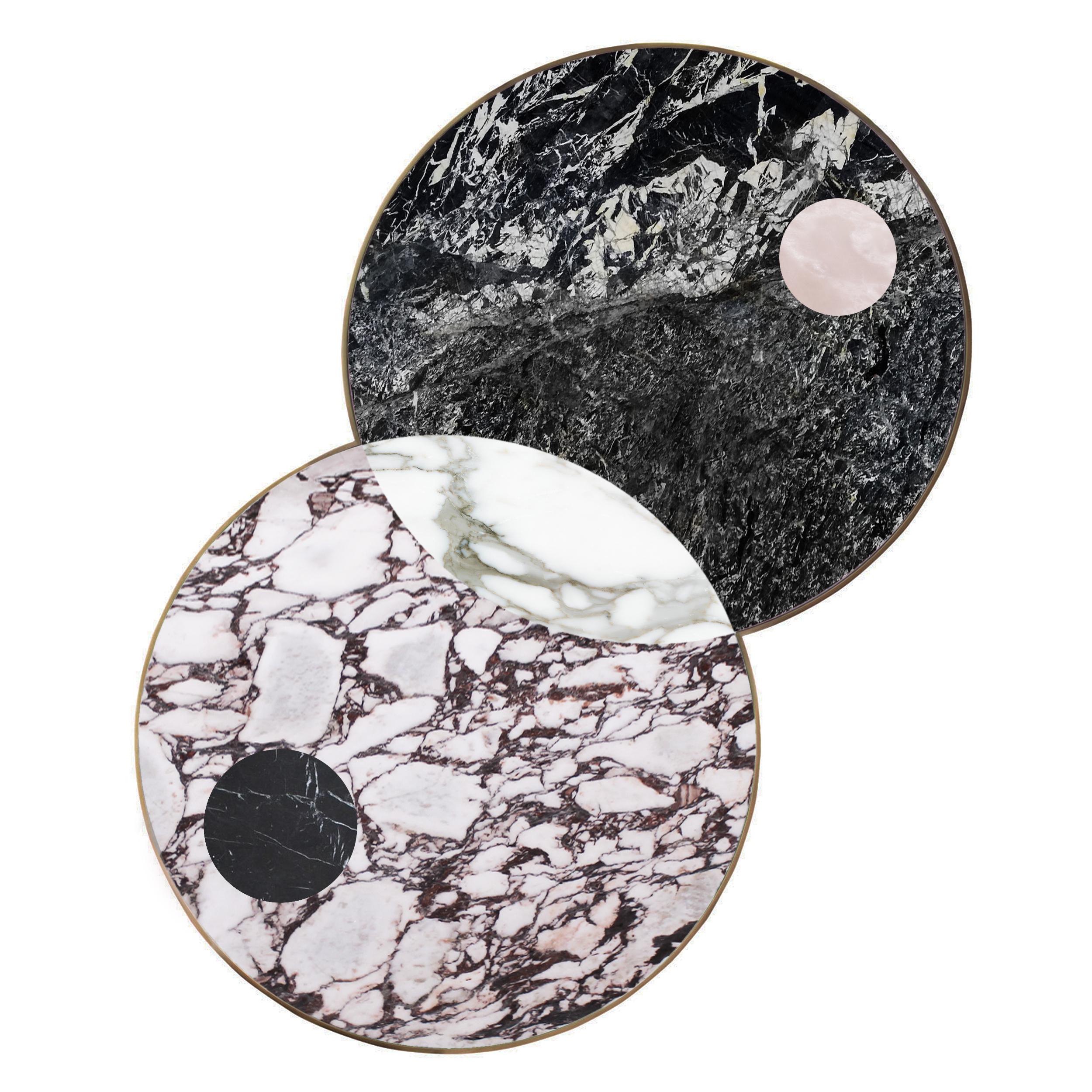 The Lunar Collection introduces the Half Moon dining table, the Sun and Moon coffee table and the Full Moon side table. Discs echoing planetary forms are bisected or overlaid to create surface patterns and structural elements, forming