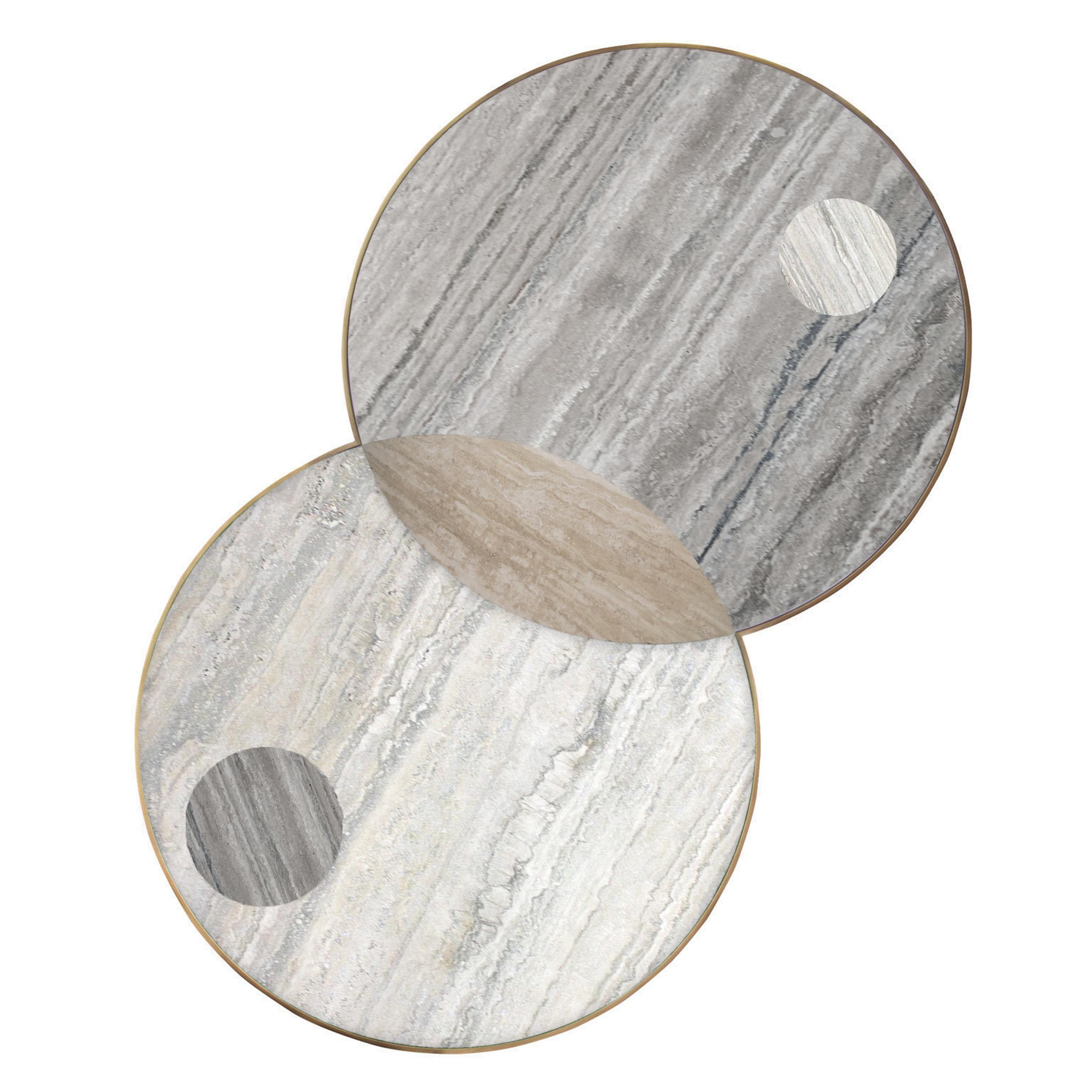 The Lunar Collection consists of the Half Moon dining table, the Sun and Moon coffee table and the Full Moon side table. Discs echoing planetary forms are bisected or overlaid to create surface patterns and structural elements, forming