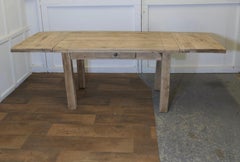 Sun Bleached Oak 7ft Extending Dining Table  The table is very heavy an solid