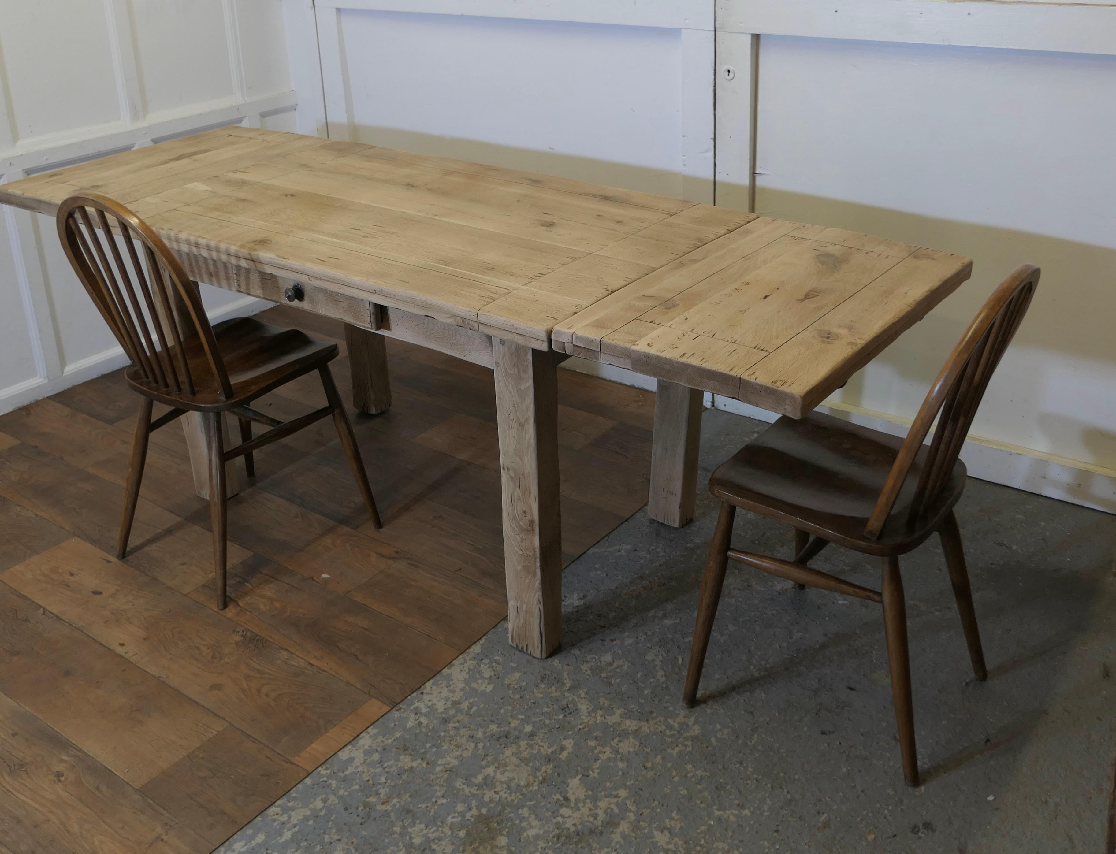 Sun Bleached Oak 7ft Extending Dining Table  The table is very heavy an solid 1