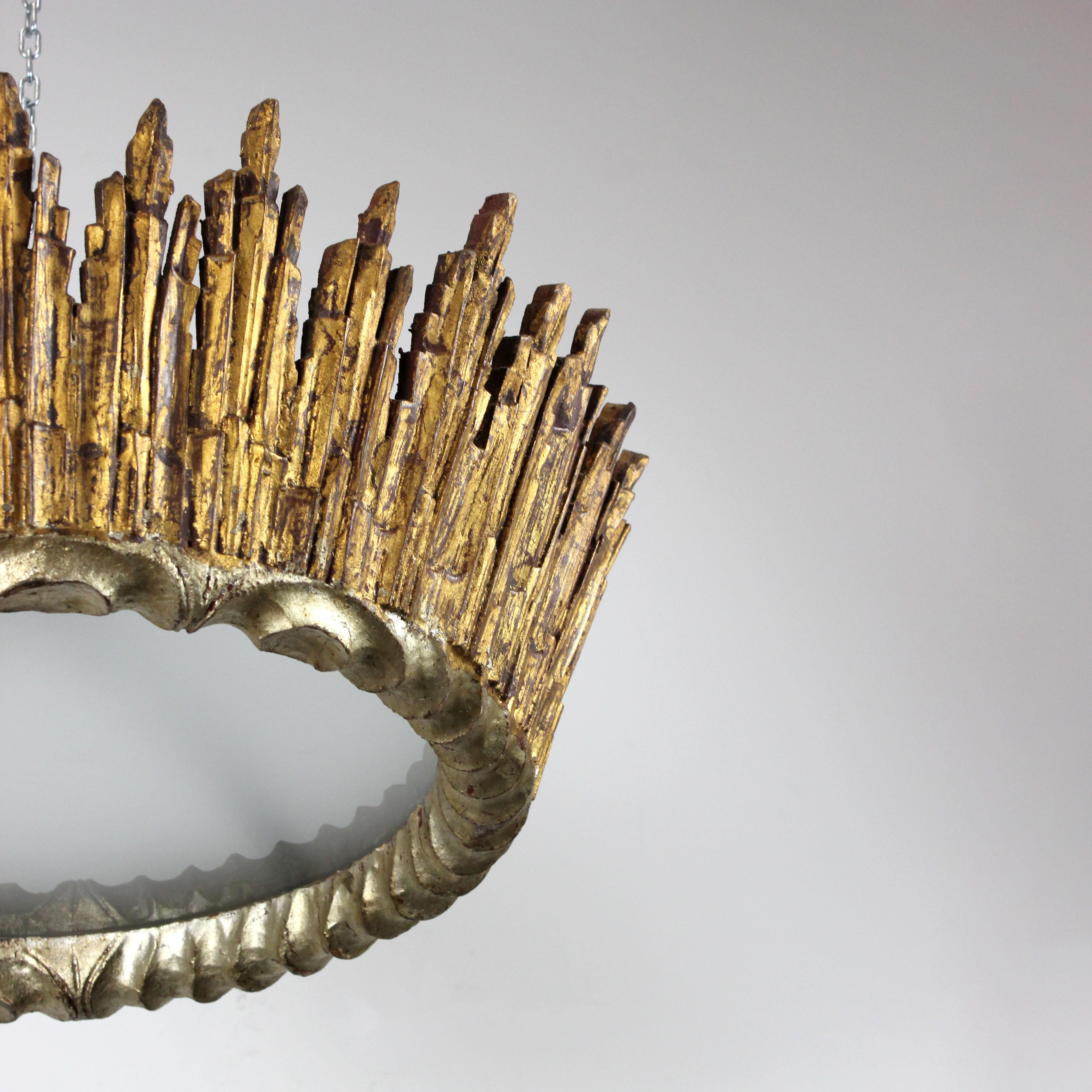 Ceiling lamp 'Sun', crafted from wood with gold and silver leaf detailing and an acid-etched glass shade.