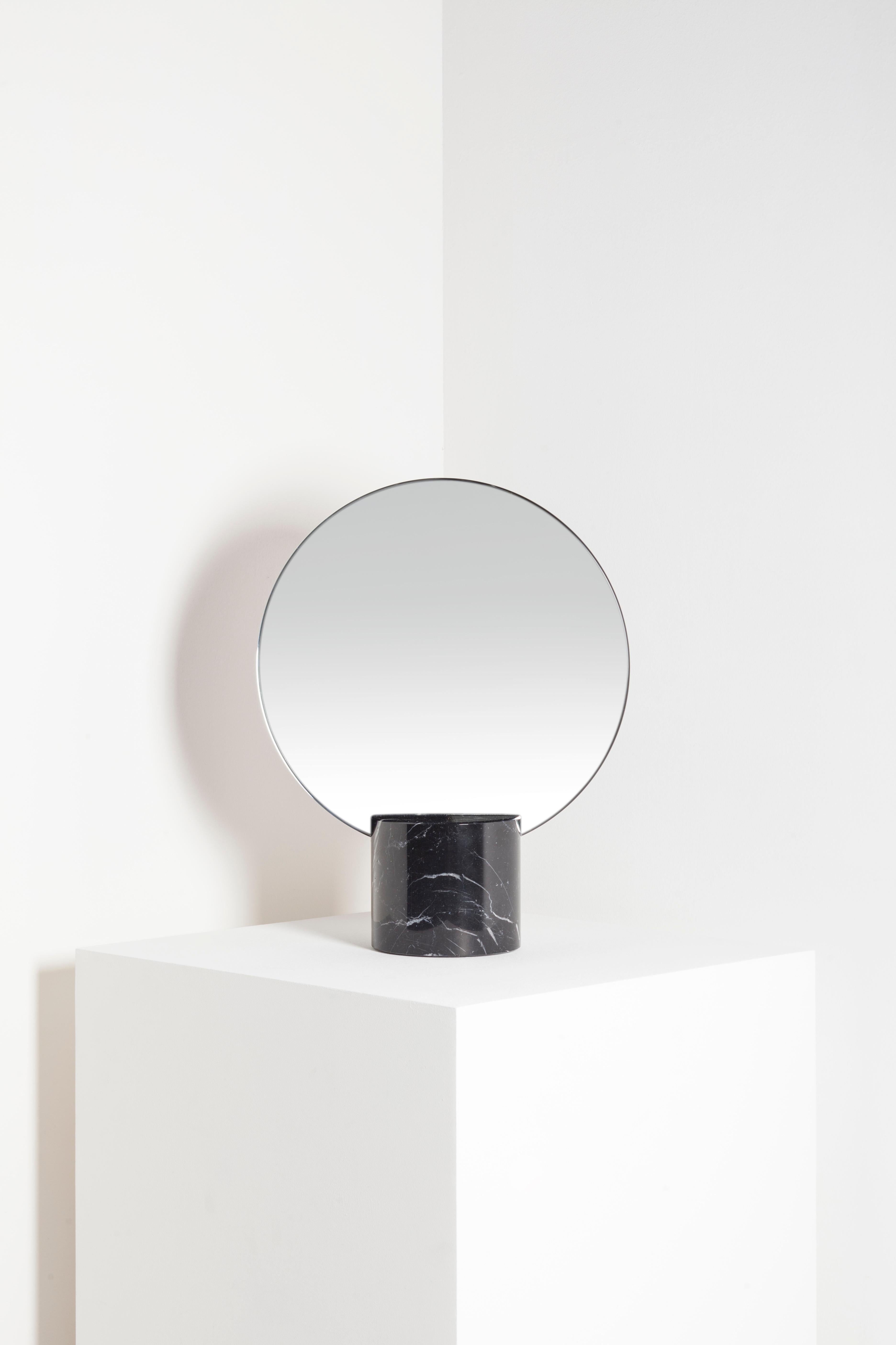 Sun Marquina marble mirror by Joseph Vila Capdevila
Material: Marquina marble, brass and mirror
Dimensions: 30 x 38 x 12 cm
Weight: 4.7 kg

Luxurious mirror in two separated parts: the base, made with premium Carrara marble, and mirror, that