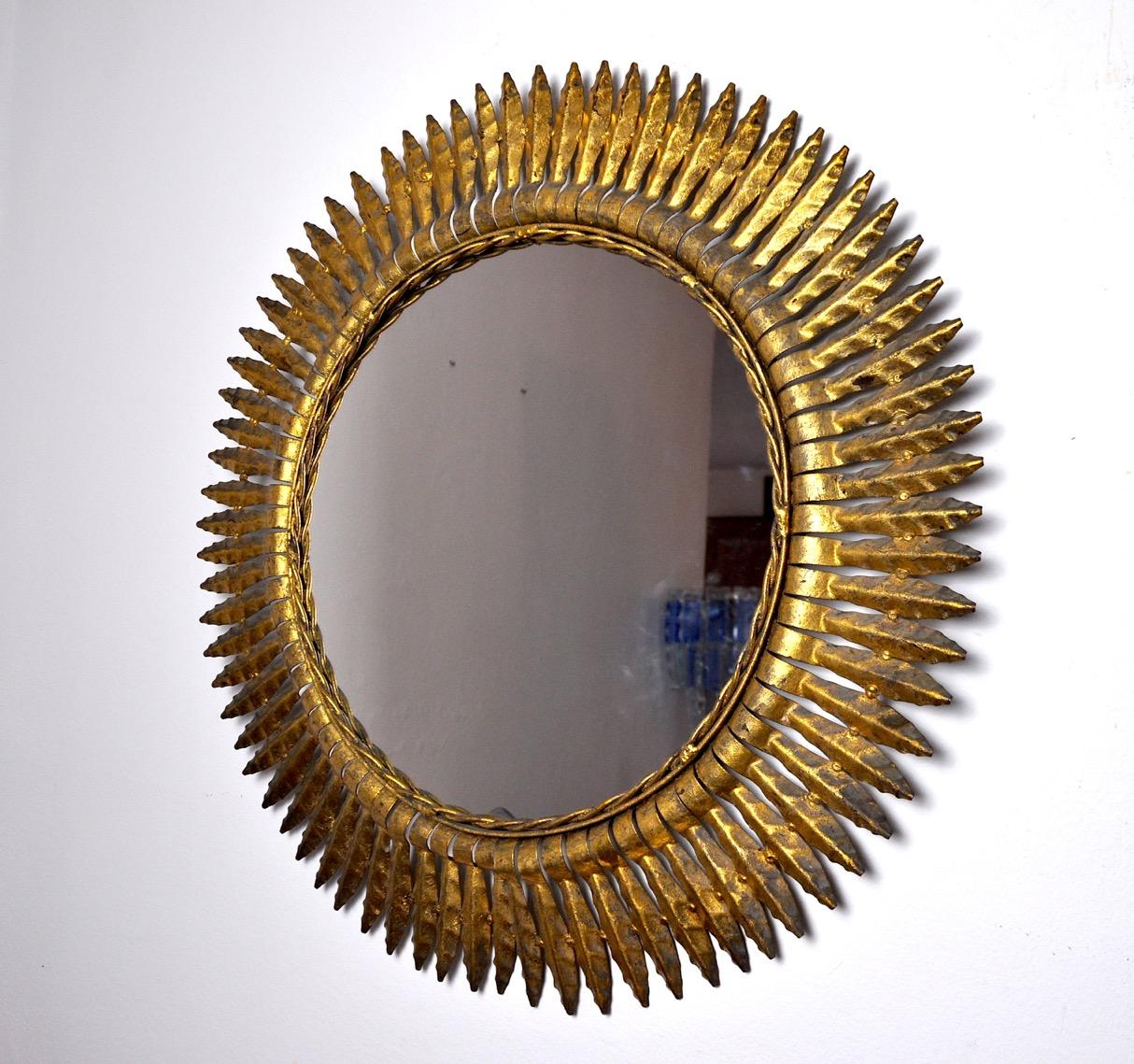 Hollywood Regency Sun mirror, gilded metal with gold leaf, Italy, 1960