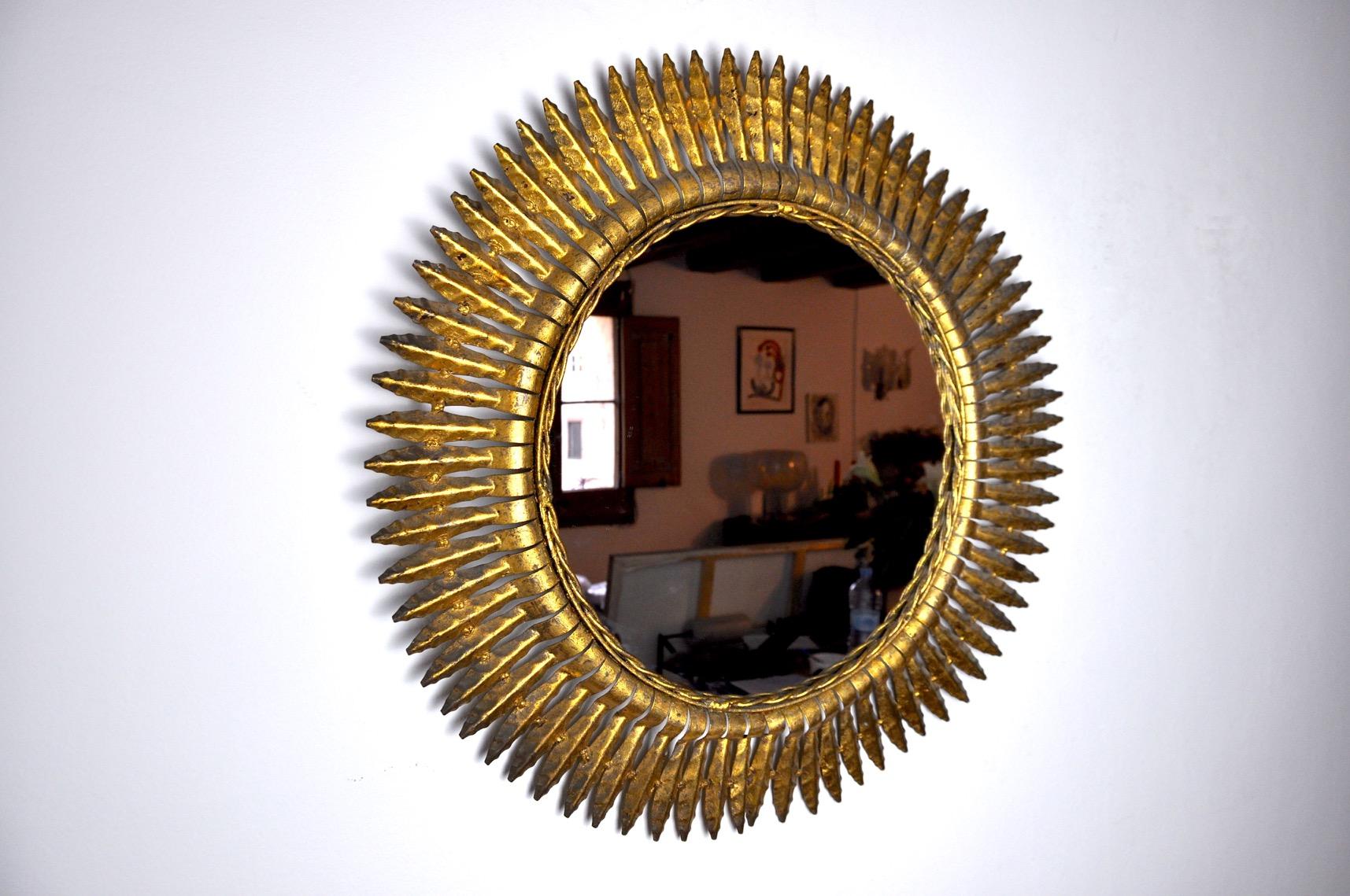 Sun mirror, gilded metal with gold leaf, Italy, 1960 In Good Condition In BARCELONA, ES