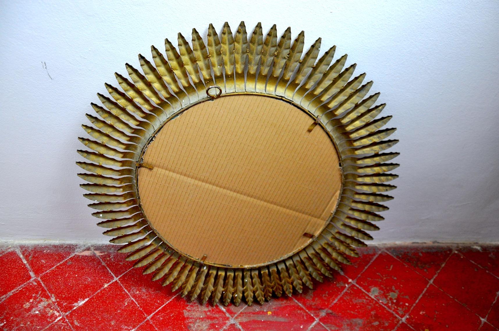 Mid-20th Century Sun mirror, gilded metal with gold leaf, Italy, 1960