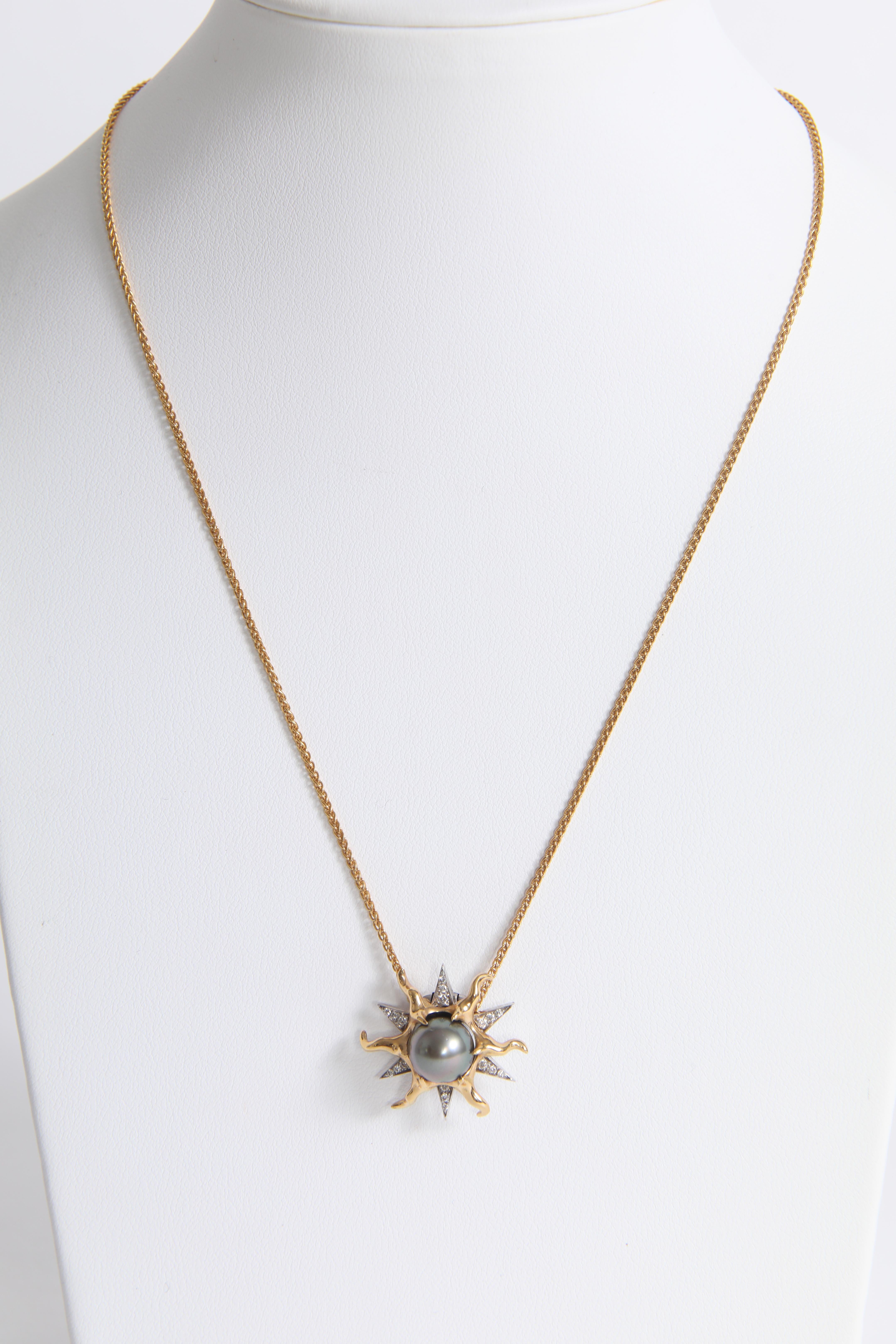 Contemporary Sun Pendant in 18K Yellow and White Gold with a Tahitian Pearl and Diamonds For Sale