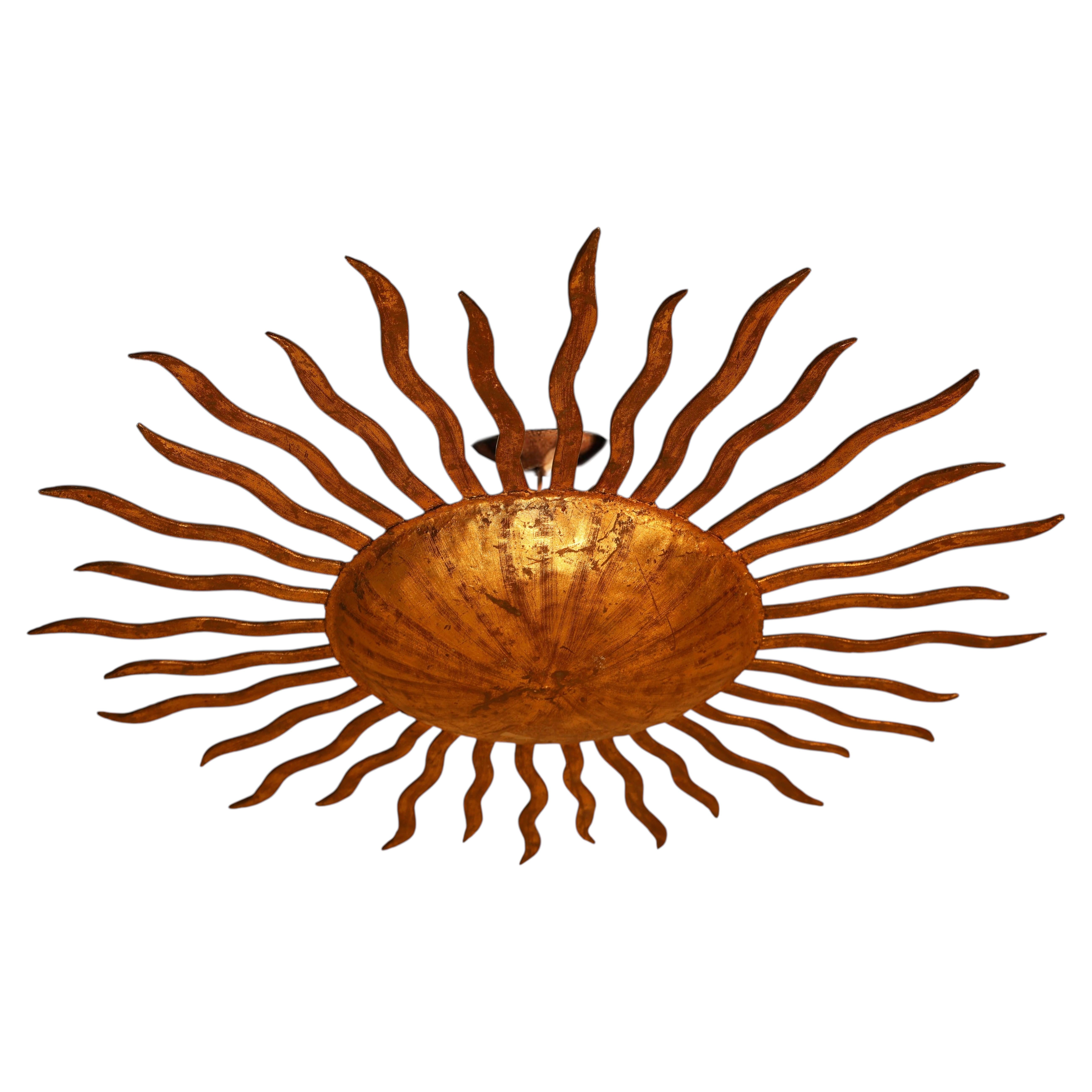 Colgante en forma de sol