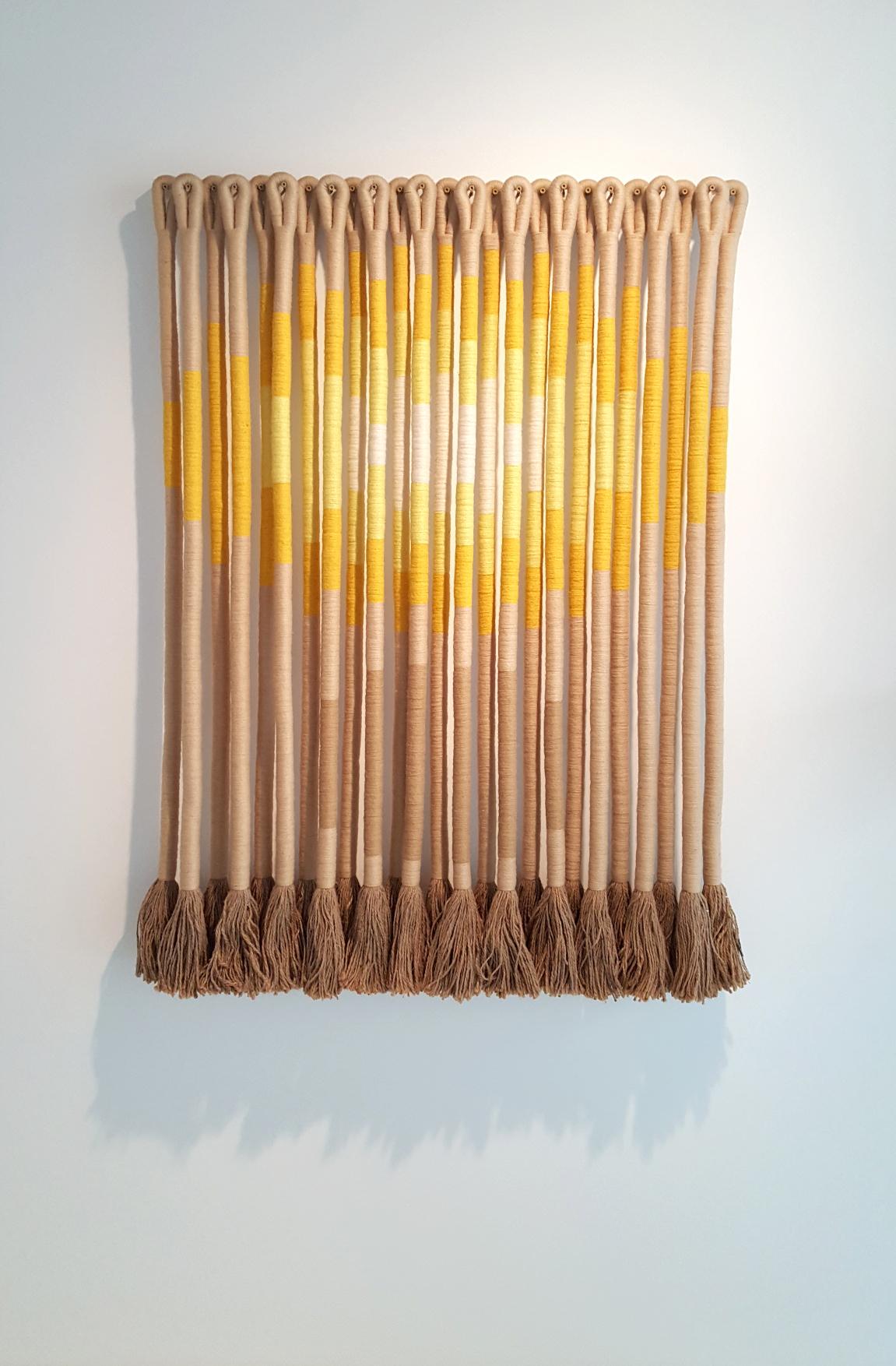'Sun Spot' by fiber artist Jane Knight. Comprised of 25 elements signed with copper metal tag. Excellent Condition.

Jane Knight (1928-2013) was born in Grosse Pointe and received her BFA from the University of Michigan in 1951. After graduation,