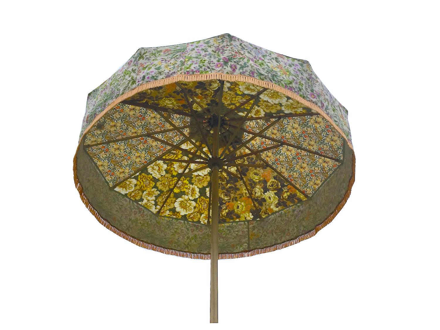 You are viewing one of Sunbeam Jackie's iconic sun umbrellas. 

This patio umbrella is made using a unique combination of vintage fabrics from legendary British textile houses including Designers Guild and Sanderson. See the Sunbeam Jackie