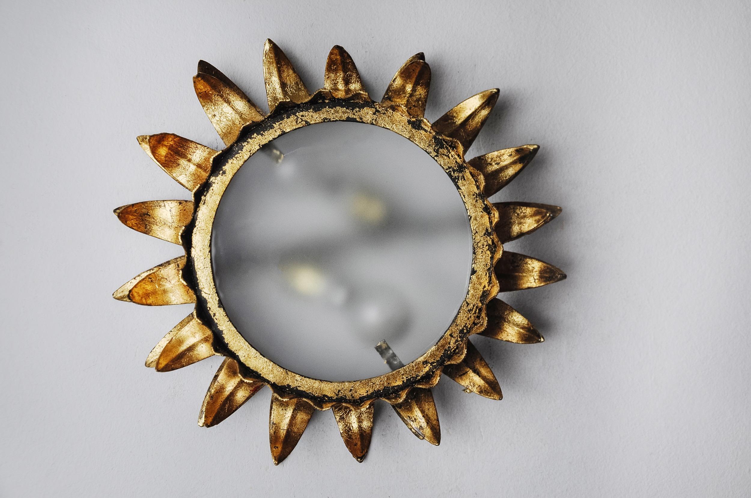 Hollywood Regency Sun wall lamp by ferro arte, metal and gold leaf, spain, 1960 For Sale