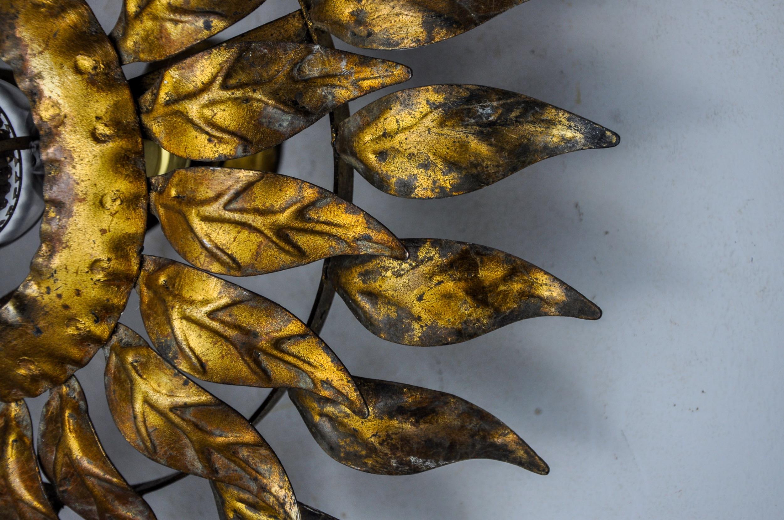 Spanish Sun wall lamp by ferro arte, metal and gold leaf, Spain, 1960 For Sale