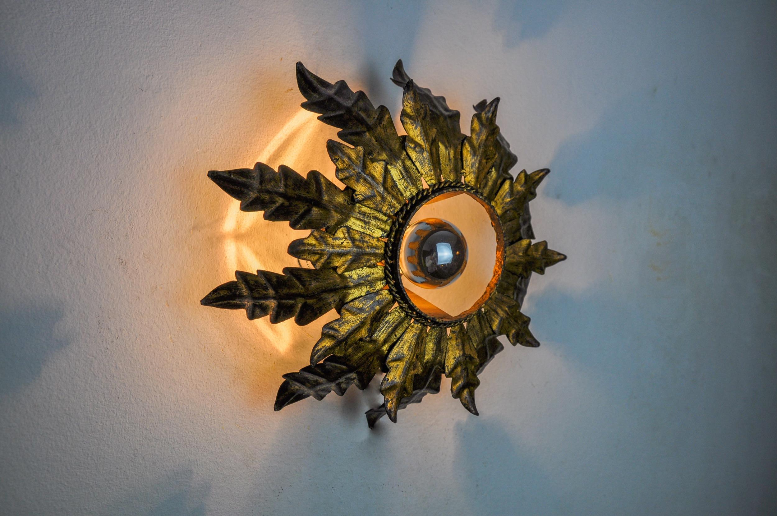 Mid-20th Century Sun wall lamp by ferro arte, metal and gold leaf, Spain, 1960 For Sale