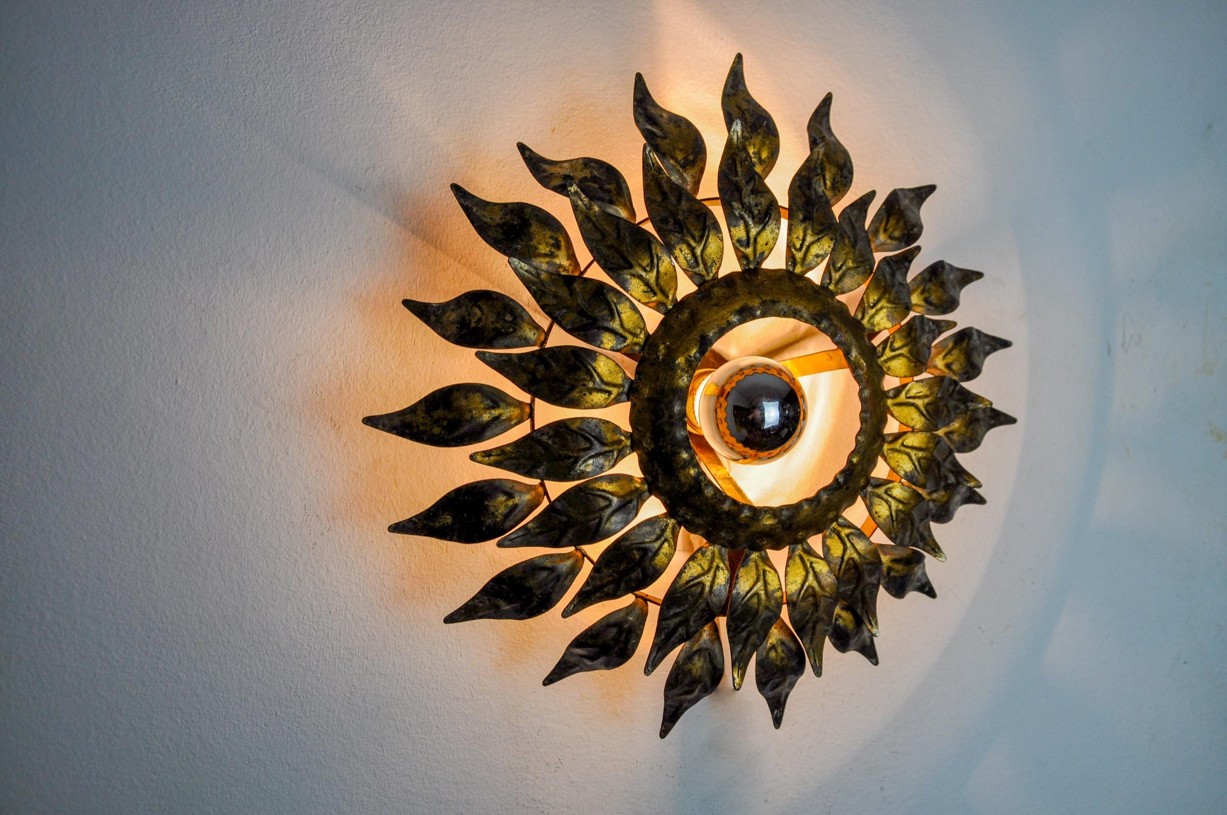 Metal Sun wall lamp by ferro arte, metal and gold leaf, Spain, 1960 For Sale