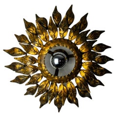 Sun wall lamp by ferro arte, metal and gold leaf, Spain, 1960