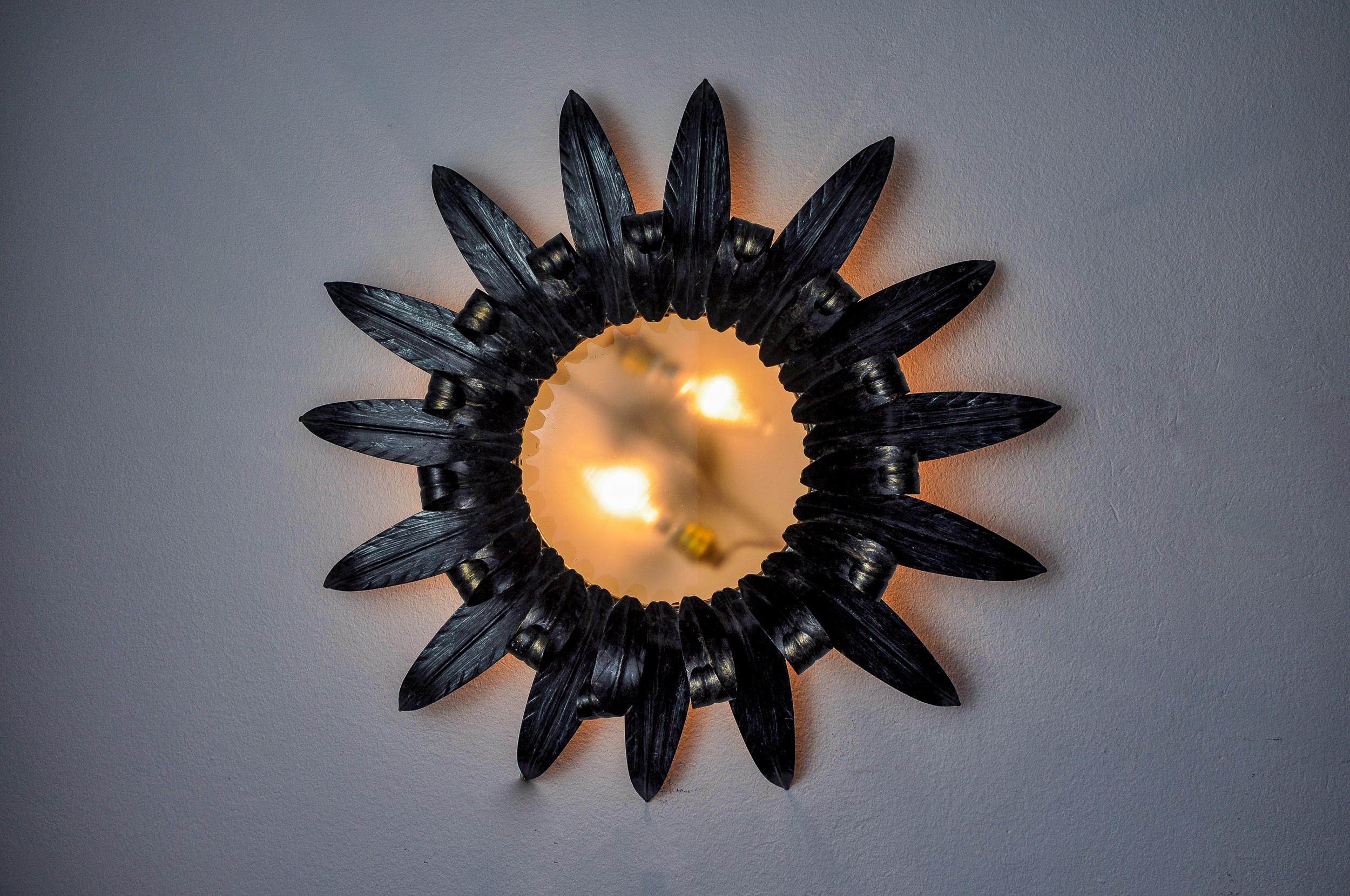 Very beautiful and large sun wall light, designed and produced by Ferro Arte in Spain in the 1960s. Silver-plated metal structure with silver leaf and opaline glass. Unique objects that will illuminate wonderfully and bring a real designer touch to