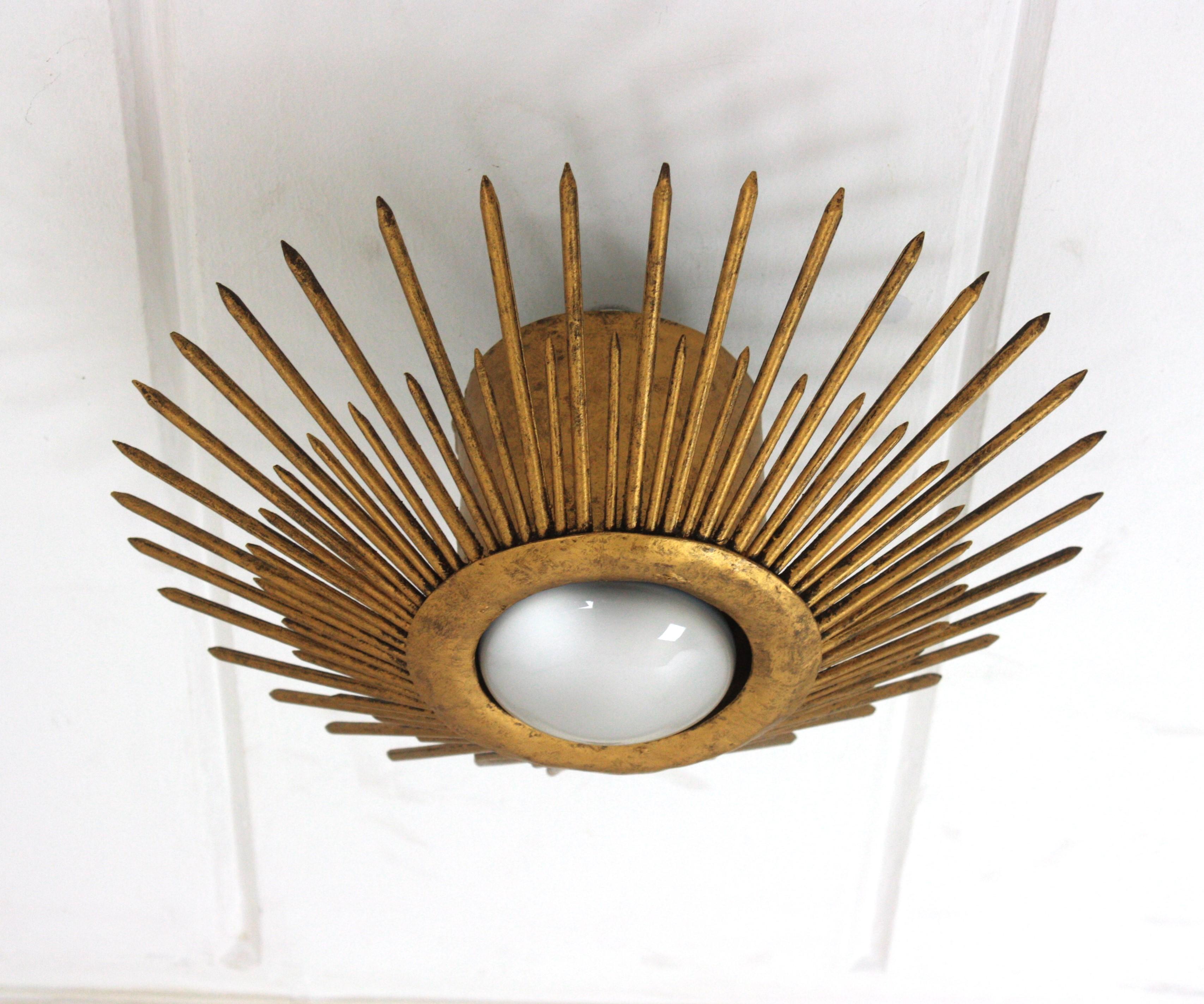 French Sunburst Brutalist Light Fixture in Gilt Iron with Nail Design For Sale