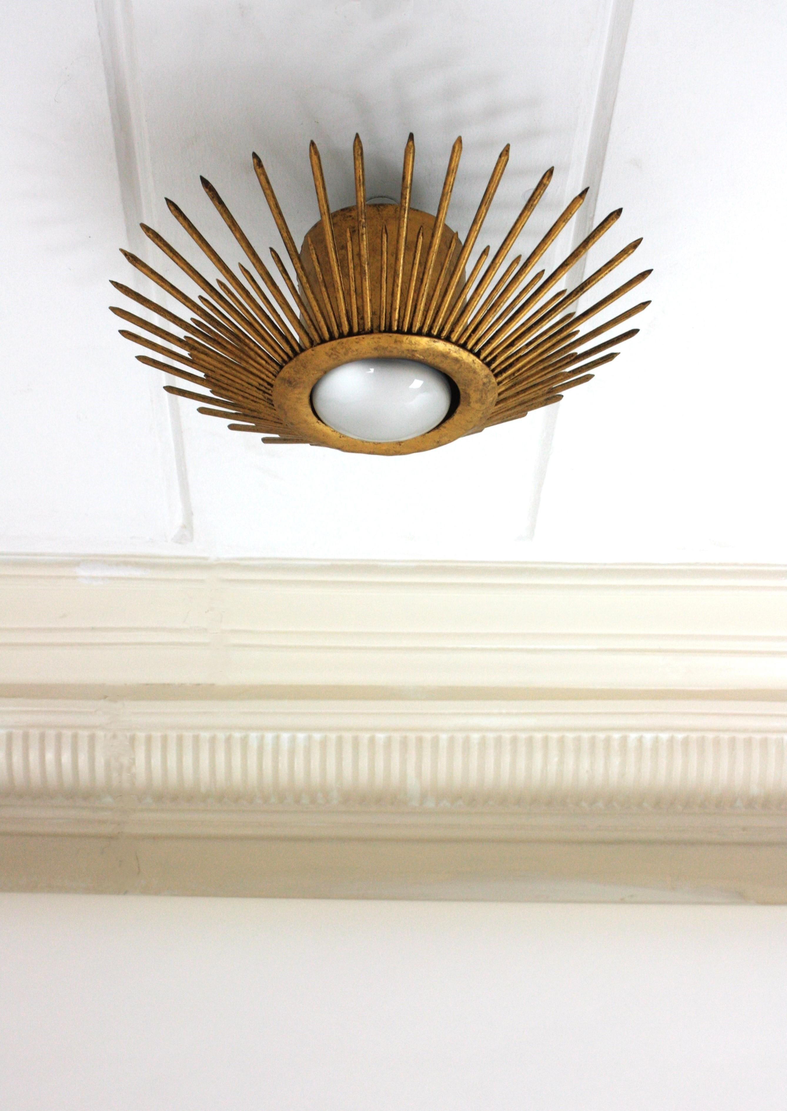 Hammered Sunburst Brutalist Light Fixture in Gilt Iron with Nail Design For Sale