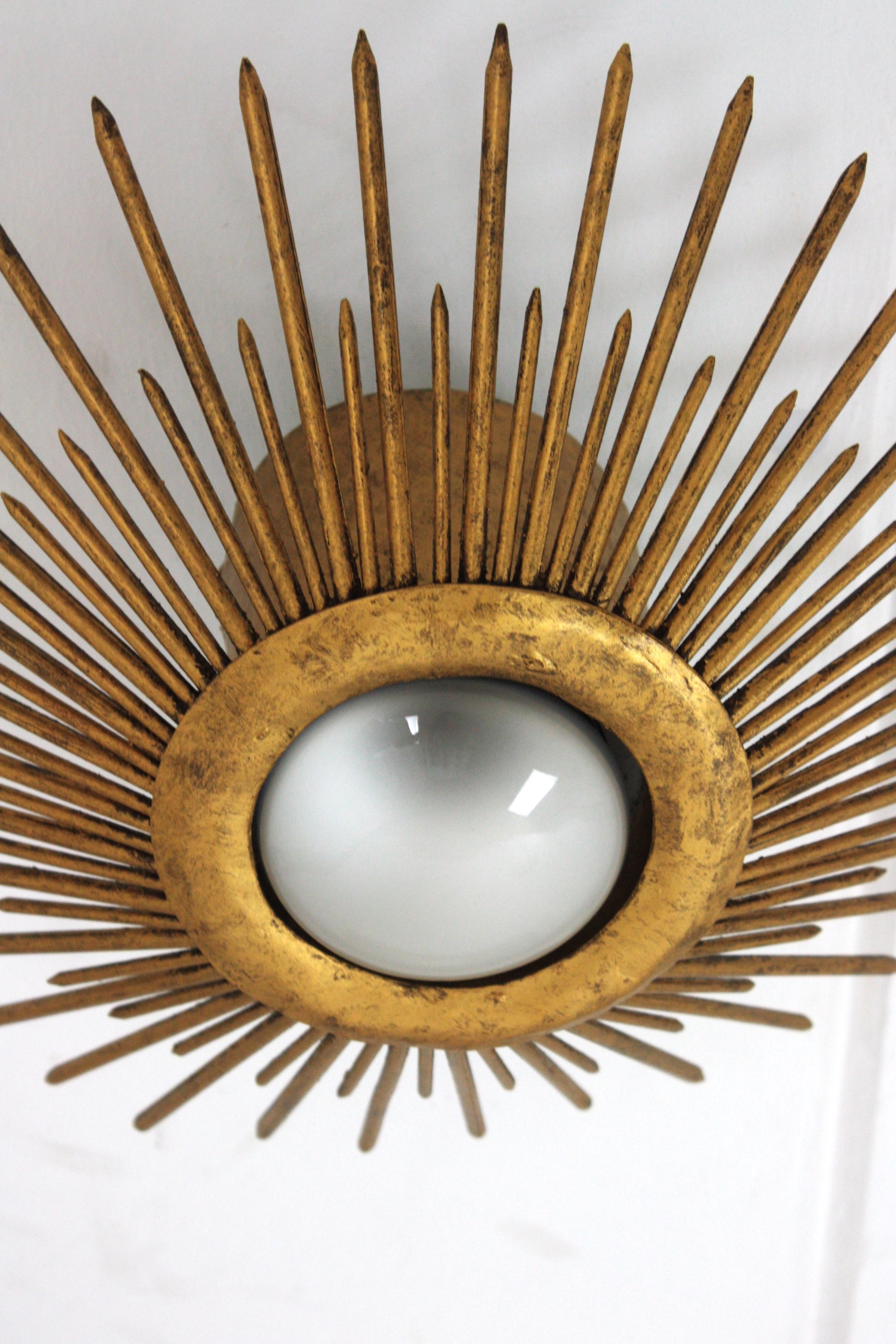 20th Century Sunburst Brutalist Light Fixture in Gilt Iron with Nail Design For Sale