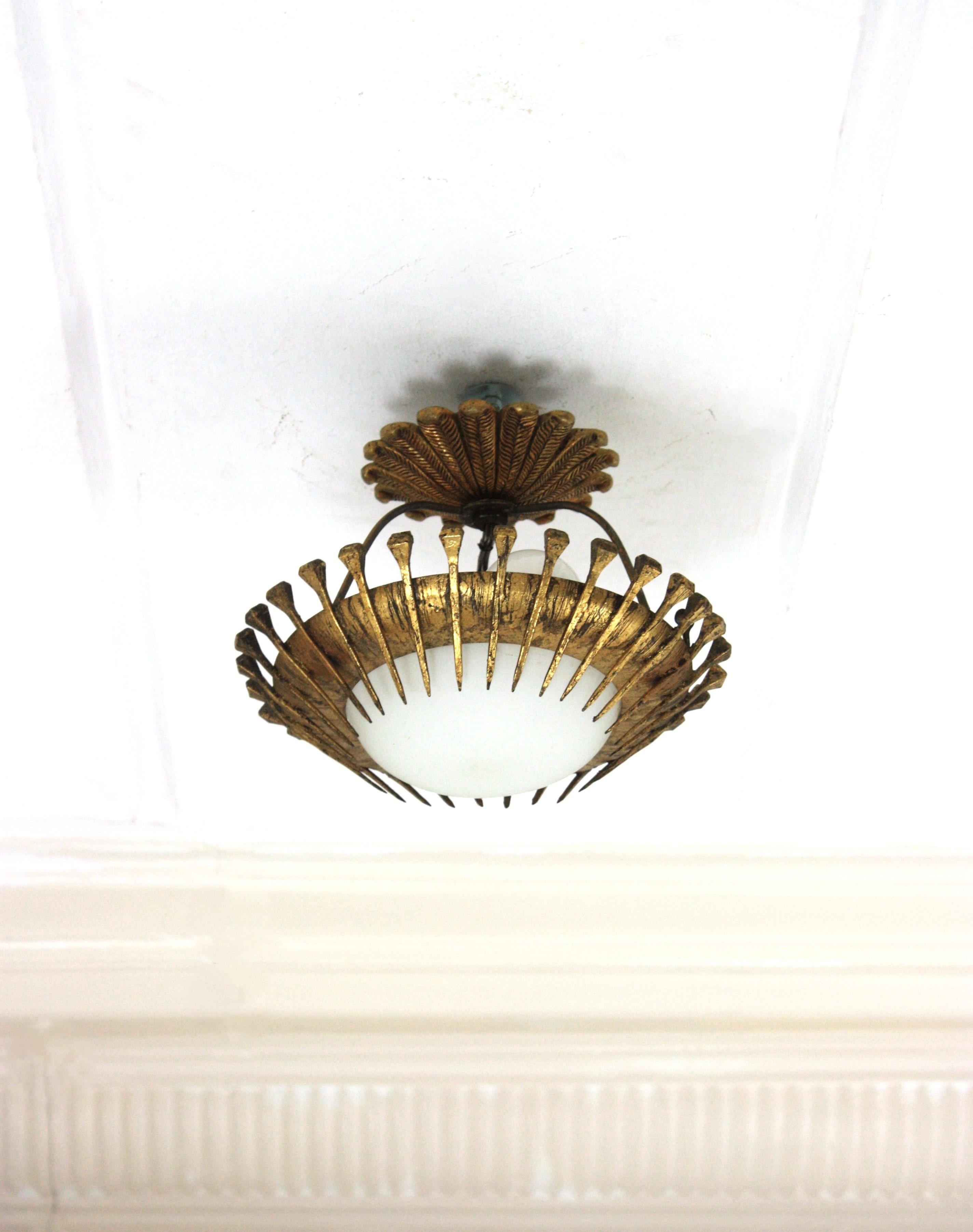 French Sunburst Light Fixture with Nails Detail, Gilt Iron and Milk Glass For Sale 1