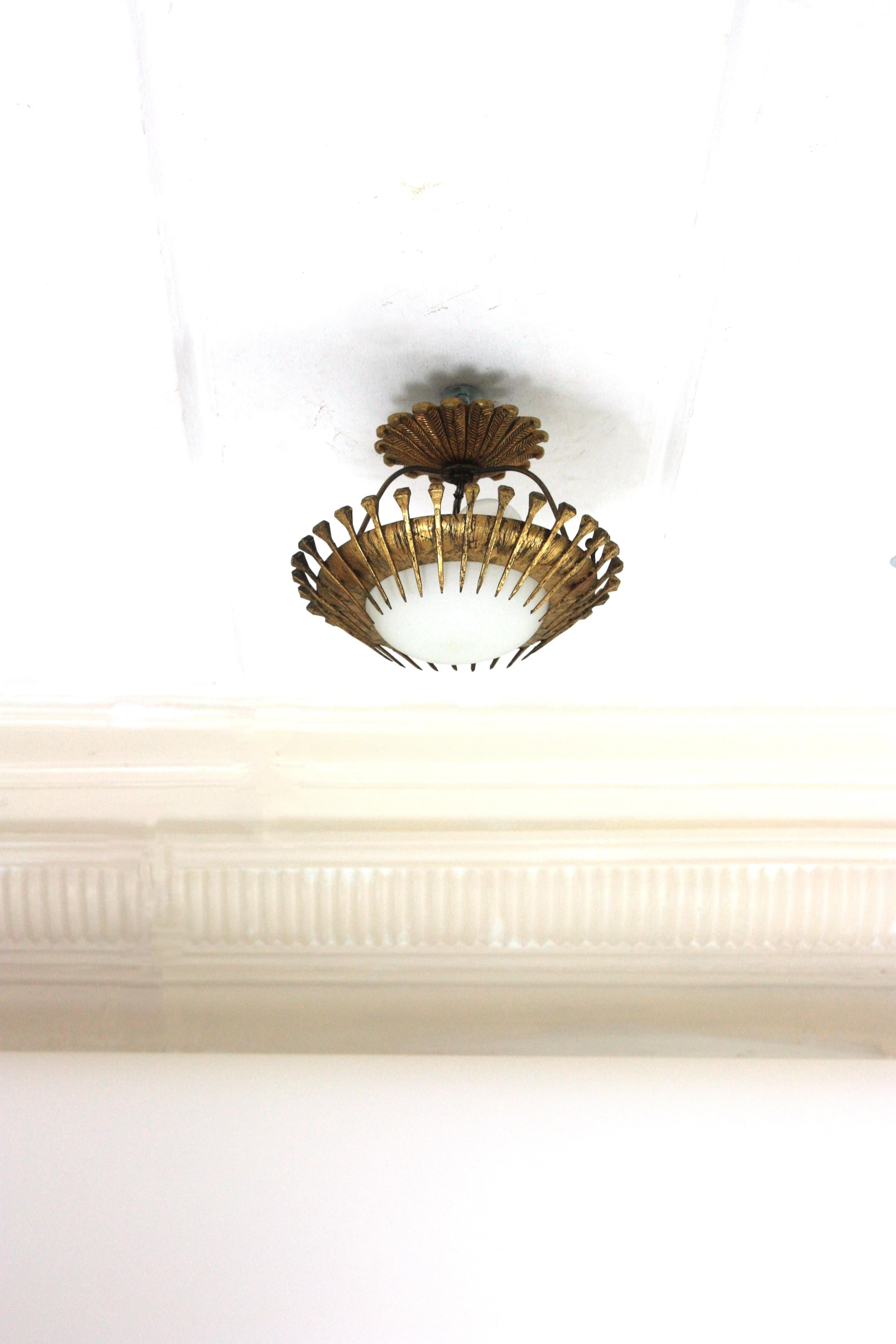 Hand-Crafted French Sunburst Light Fixture with Nails Detail, Gilt Iron and Milk Glass For Sale
