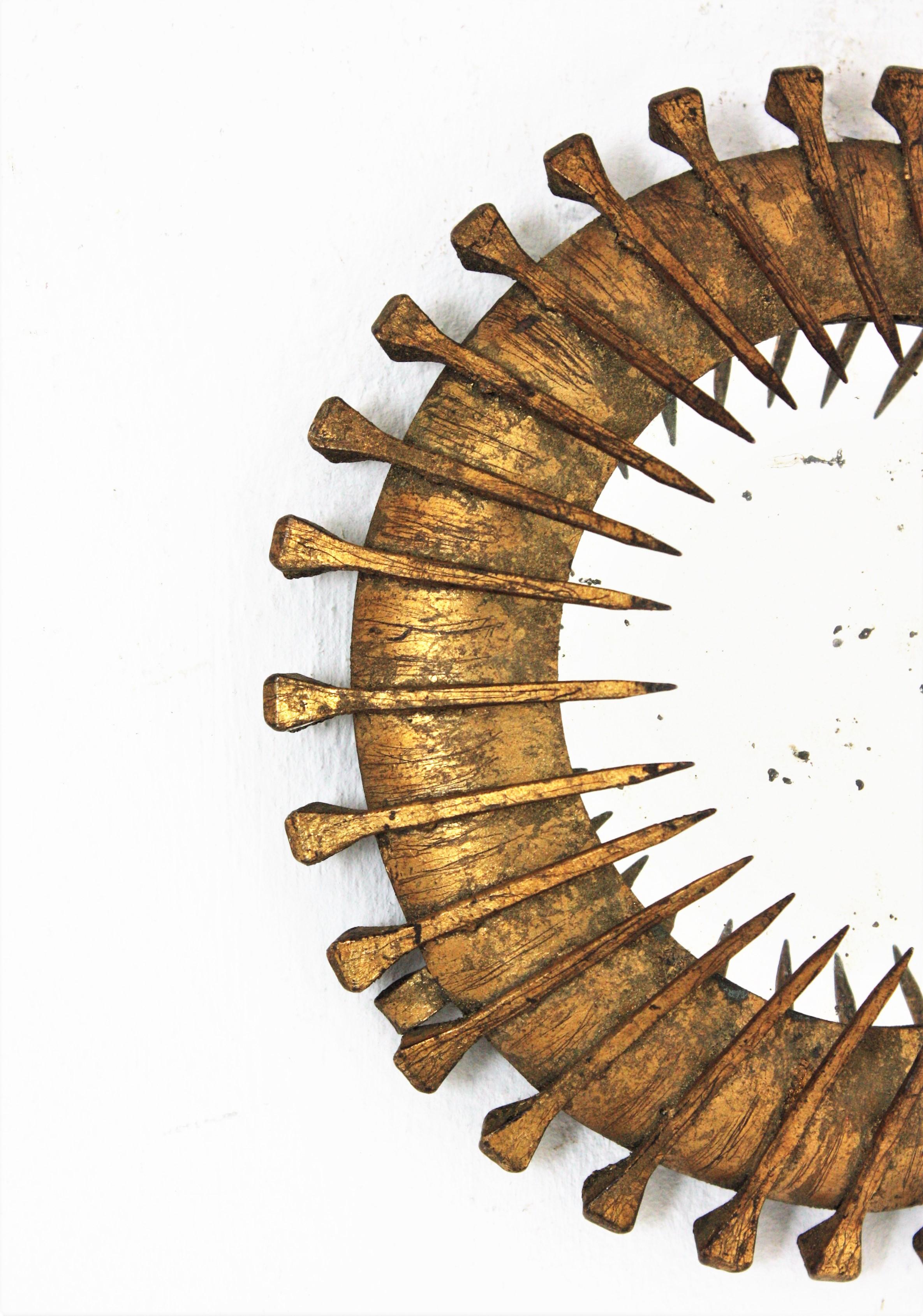 Brutalist Sunburst Mirror with Nails Detail, Gilt Iron, 1950s In Good Condition For Sale In Barcelona, ES