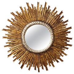 Specchio in legno dorato intagliato a raggiera, XX secolo
