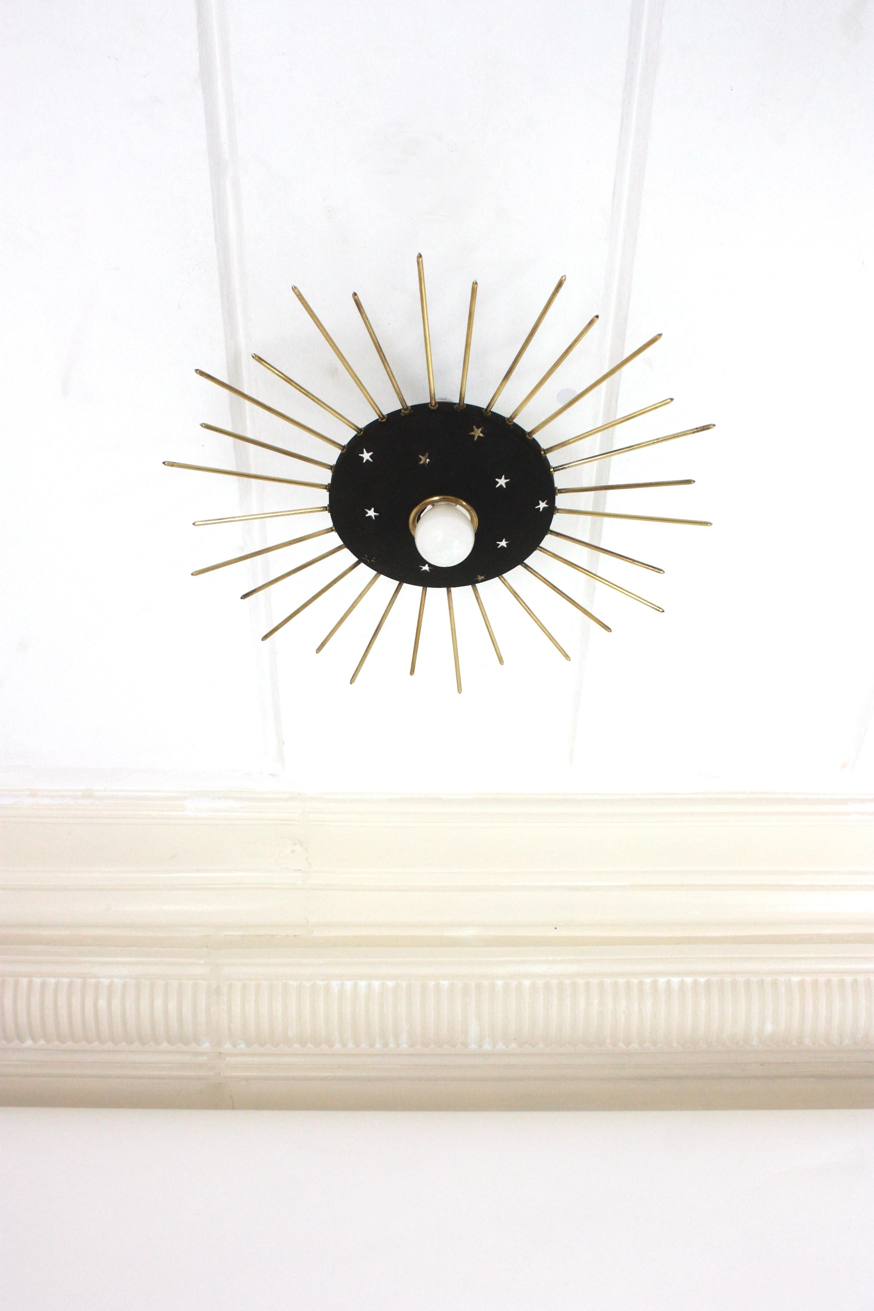 Mid-Century Modern Sunburst Ceiling Light Fixture in Black Metal & Brass with Stars Details, 1950 For Sale