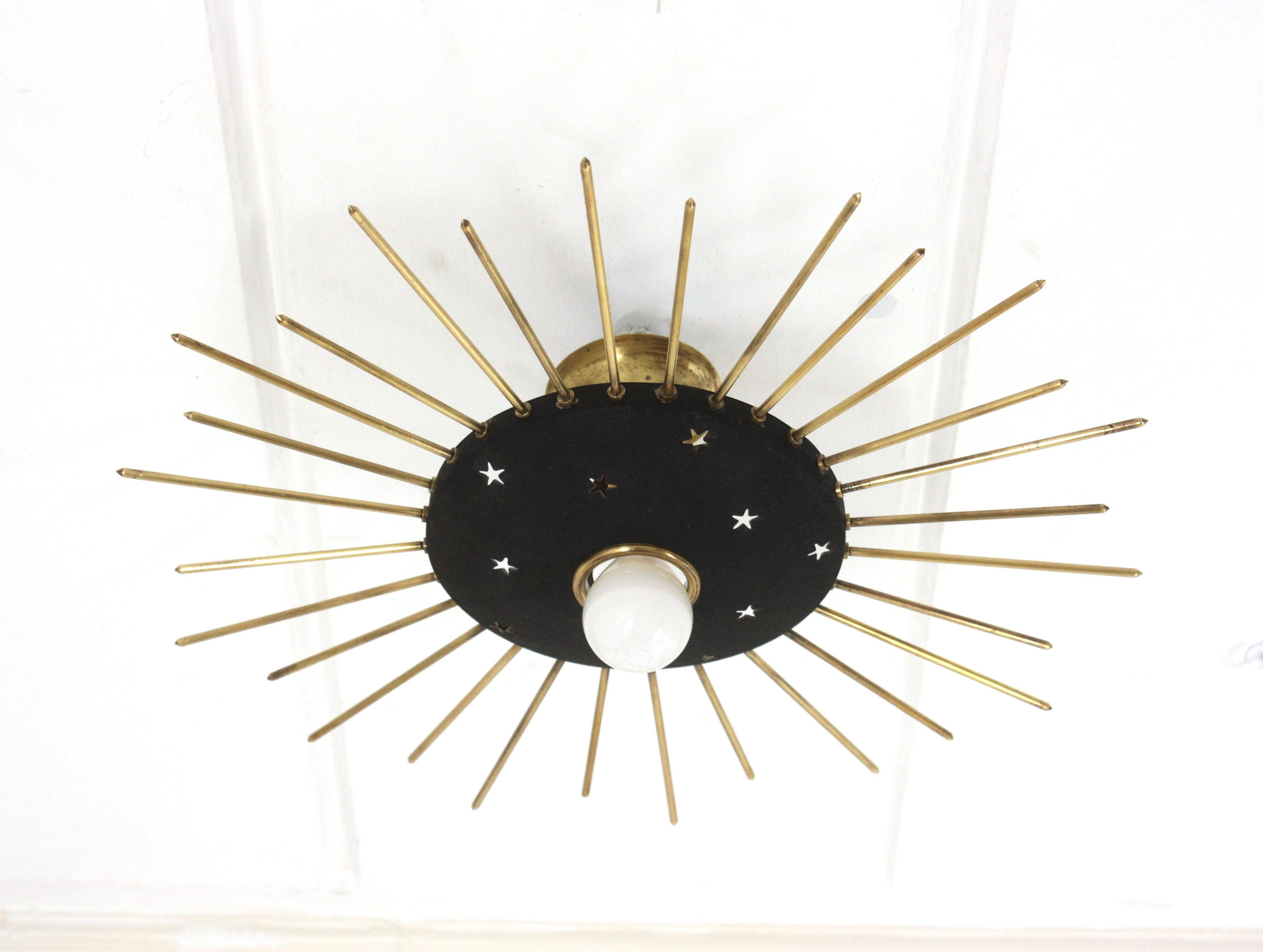 Italian Sunburst Ceiling Light Fixture in Black Metal & Brass with Stars Details, 1950 For Sale