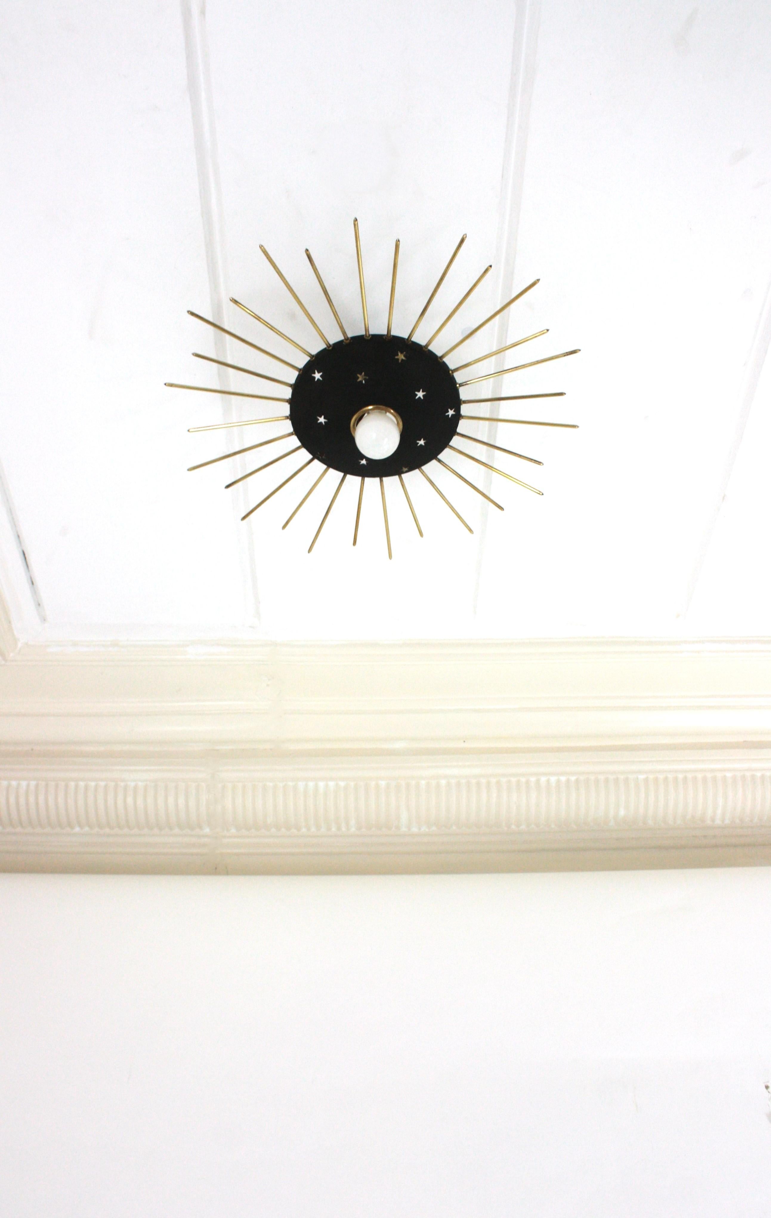 Sunburst Ceiling Light Fixture in Black Metal & Brass with Stars Details, 1950 In Good Condition For Sale In Barcelona, ES