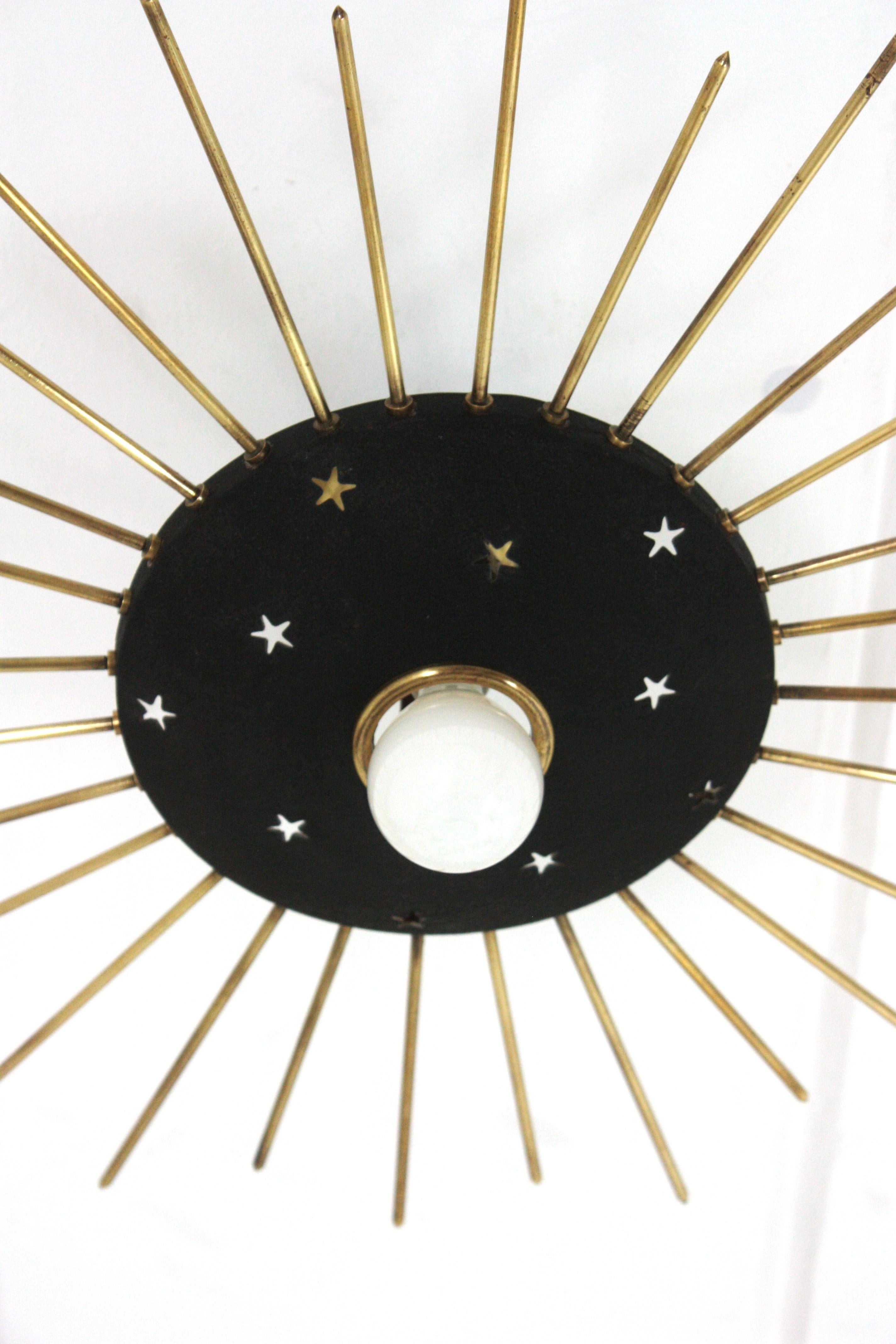Sunburst Ceiling Light Fixture in Black Metal & Brass with Stars Details, 1950 For Sale 1