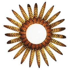 Sunburst Ceiling Light Fixture in Gilt Iron with Milk Glass Globe