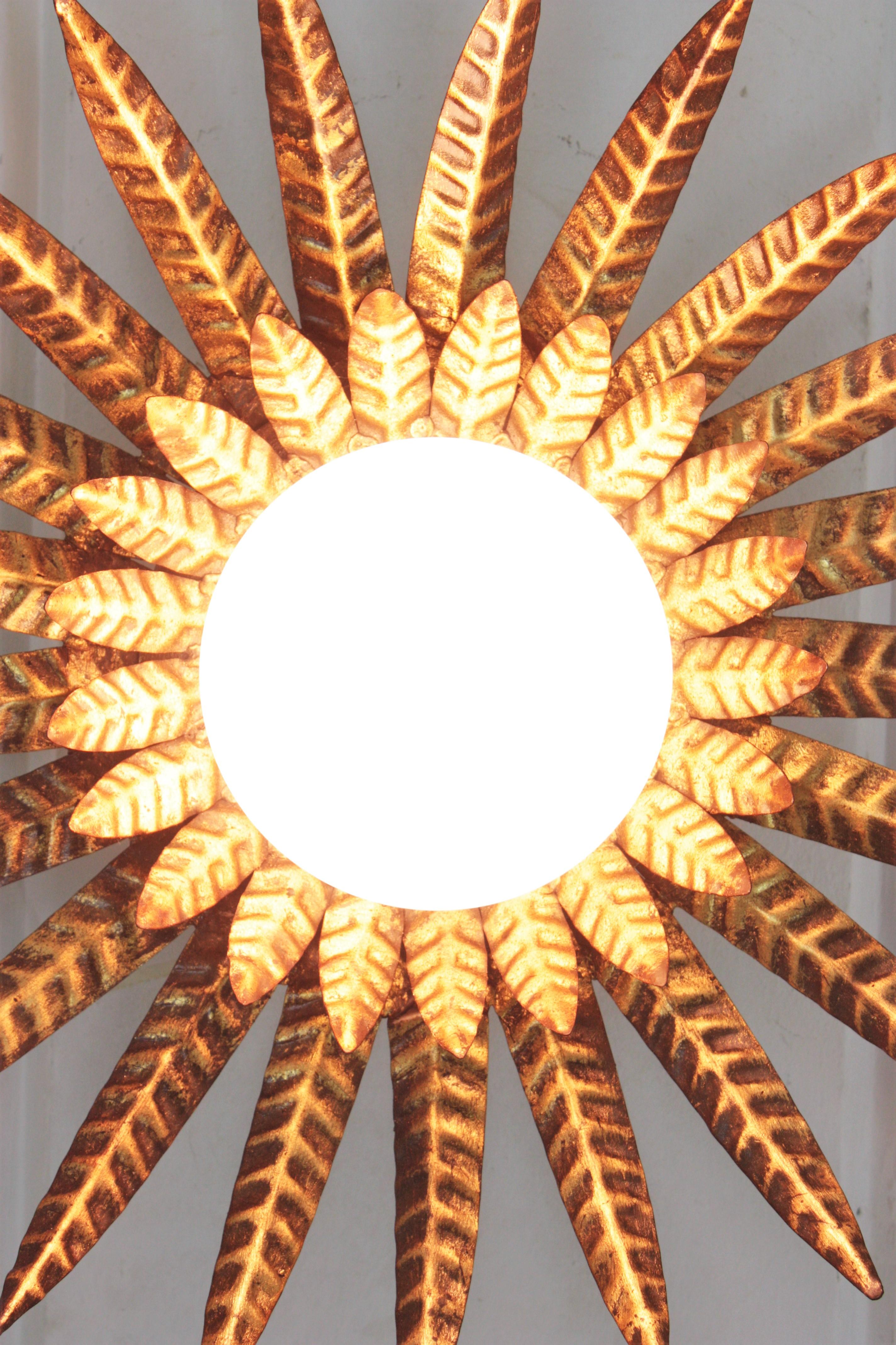 20th Century Sunburst Ceiling Light Fixture in Gilt Iron with Milk Glass Globe