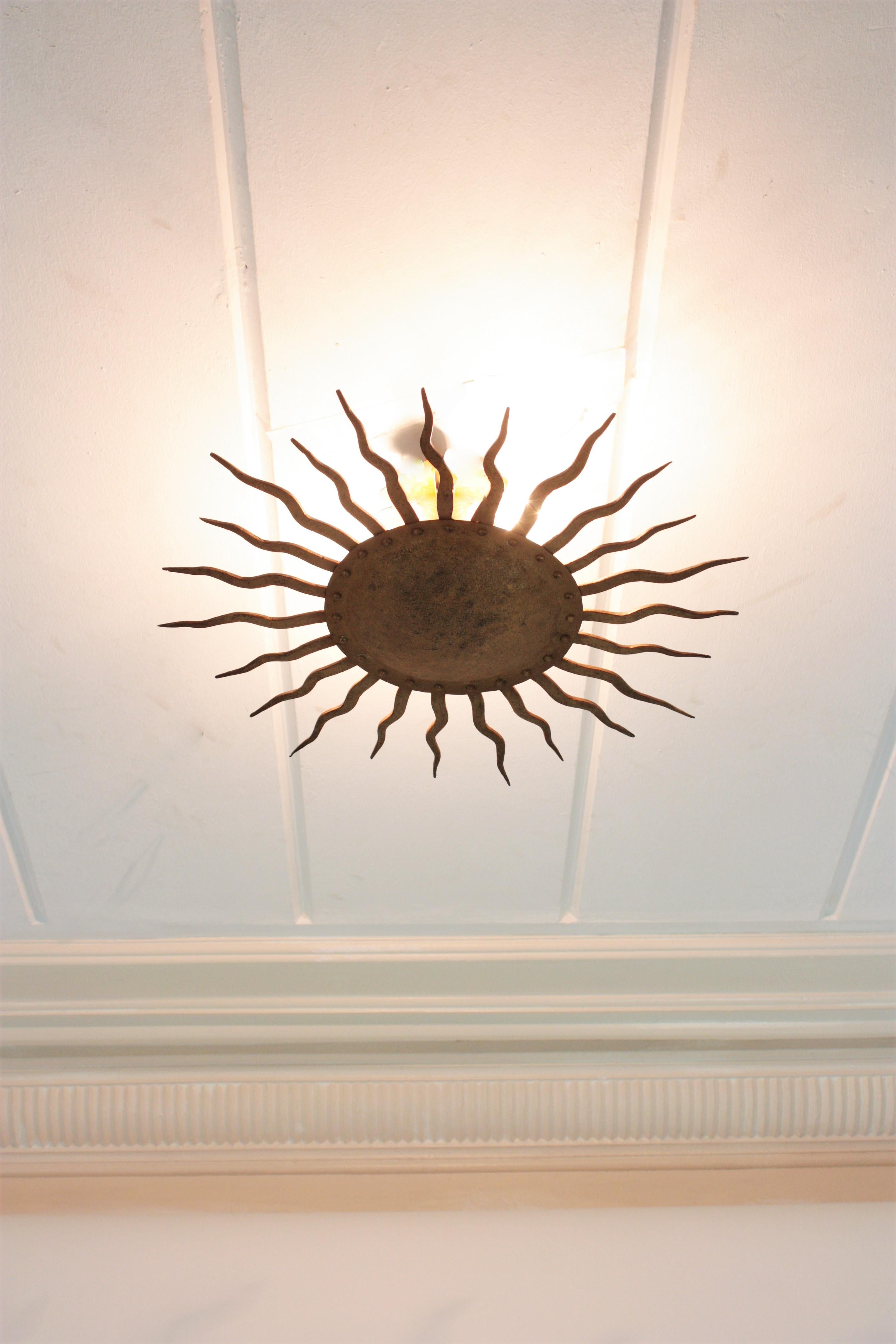 Sunburst Ceiling Light Fixture in Gilt Wrought Iron, France, 1950s 10