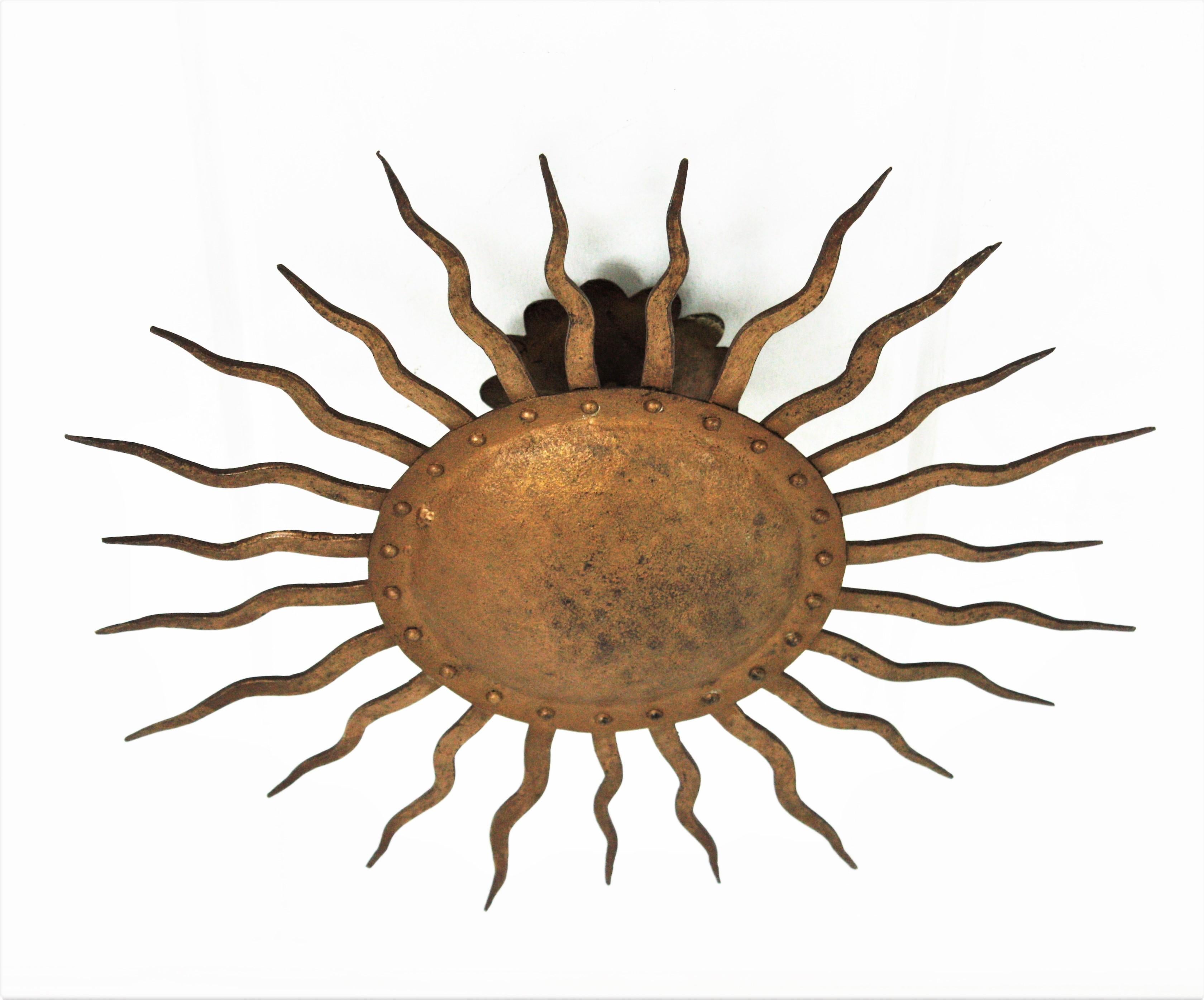 French Sunburst Ceiling Light Fixture in Gilt Wrought Iron, France, 1950s