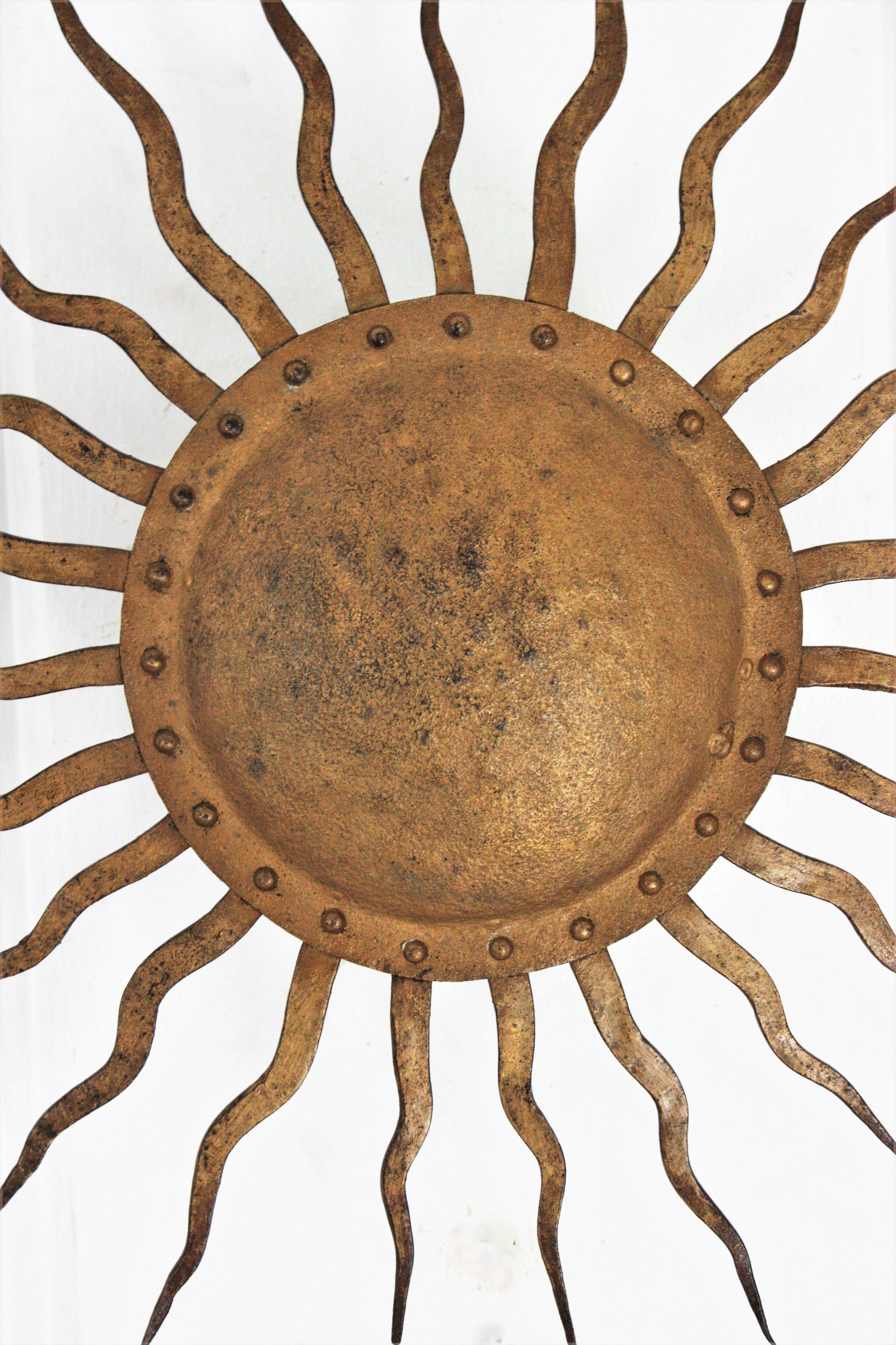 Forged Sunburst Ceiling Light Fixture in Gilt Wrought Iron, France, 1950s