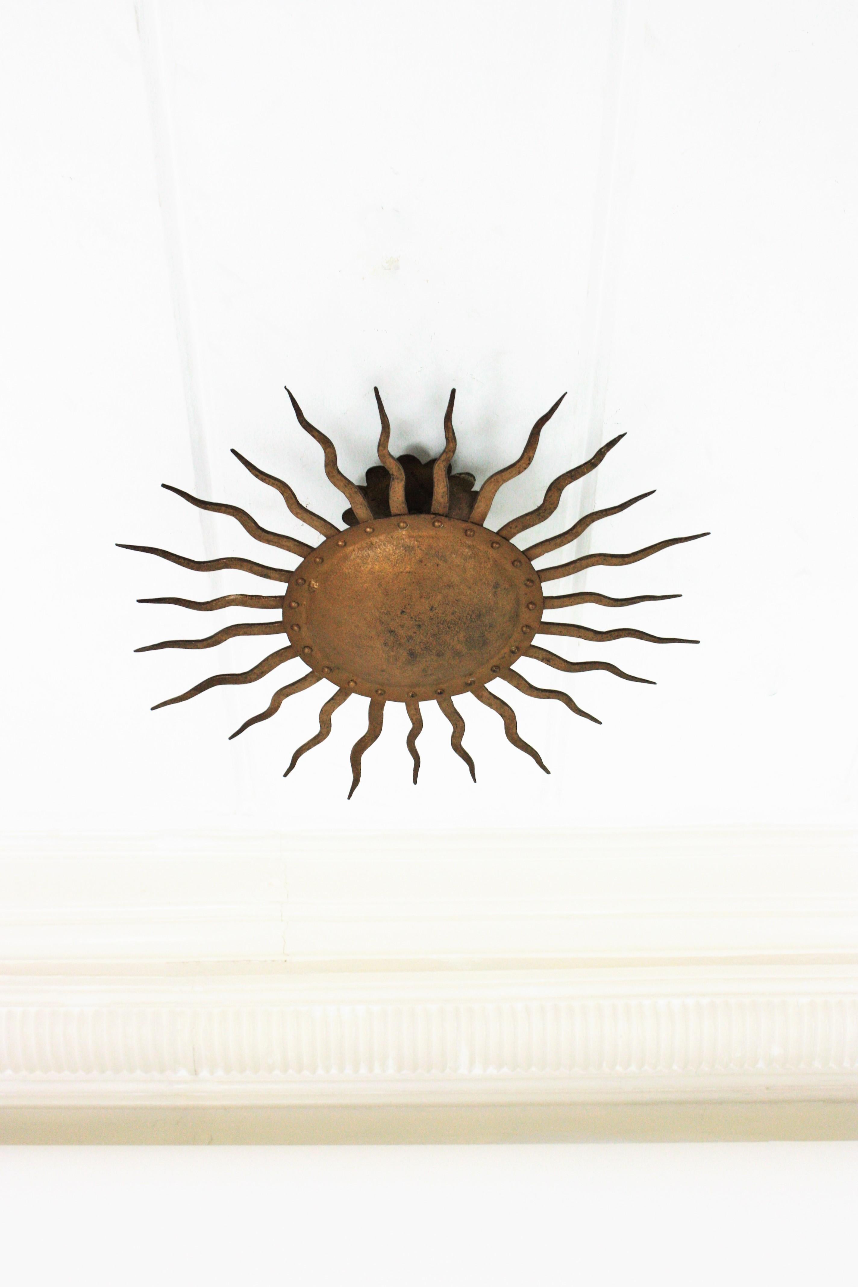 Sunburst Ceiling Light Fixture in Gilt Wrought Iron, France, 1950s In Good Condition In Barcelona, ES
