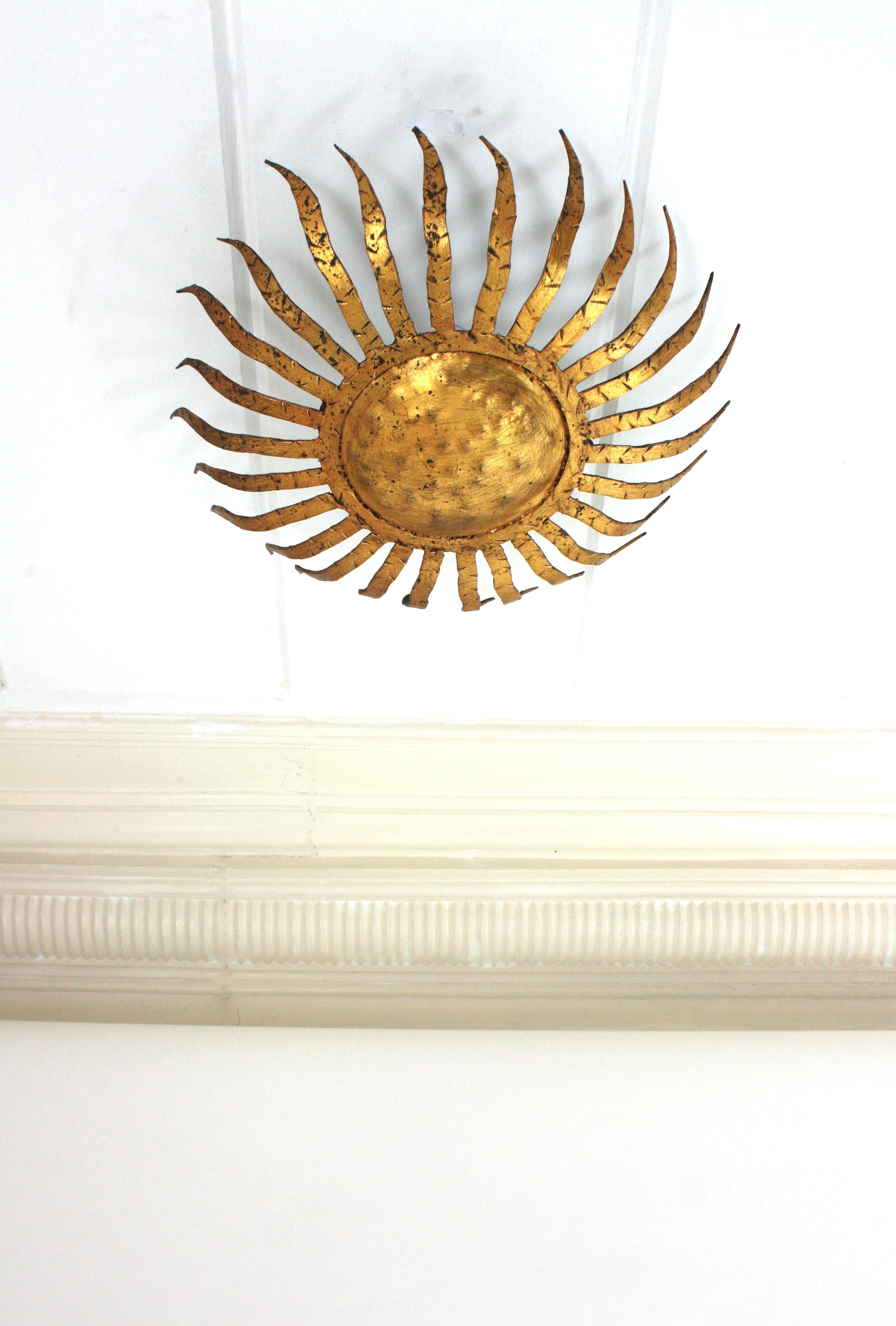 Spanish Sunburst Ceiling Light Fixture in Gilt Wrought Iron, Spain 1950s For Sale
