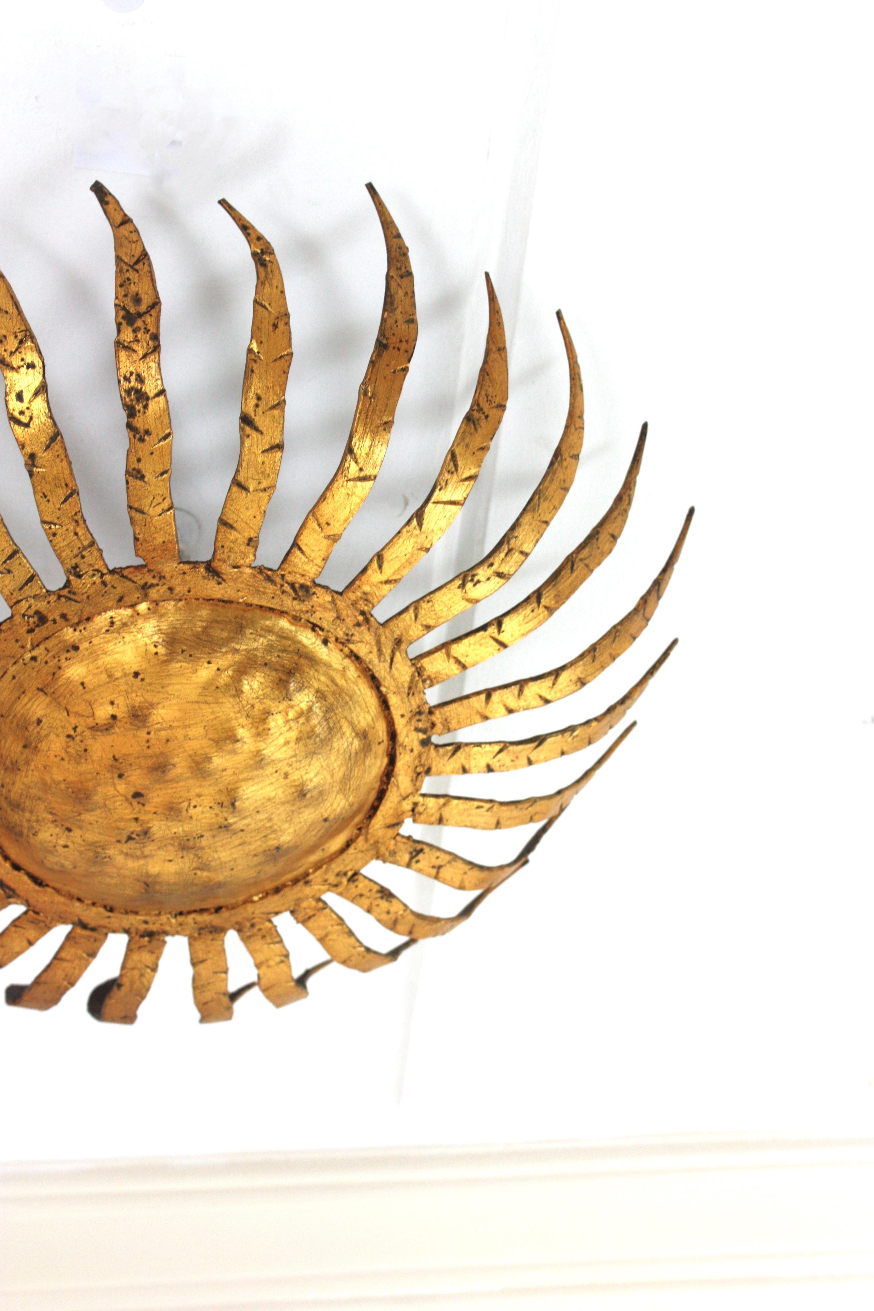 20th Century Sunburst Ceiling Light Fixture in Gilt Wrought Iron, Spain 1950s For Sale