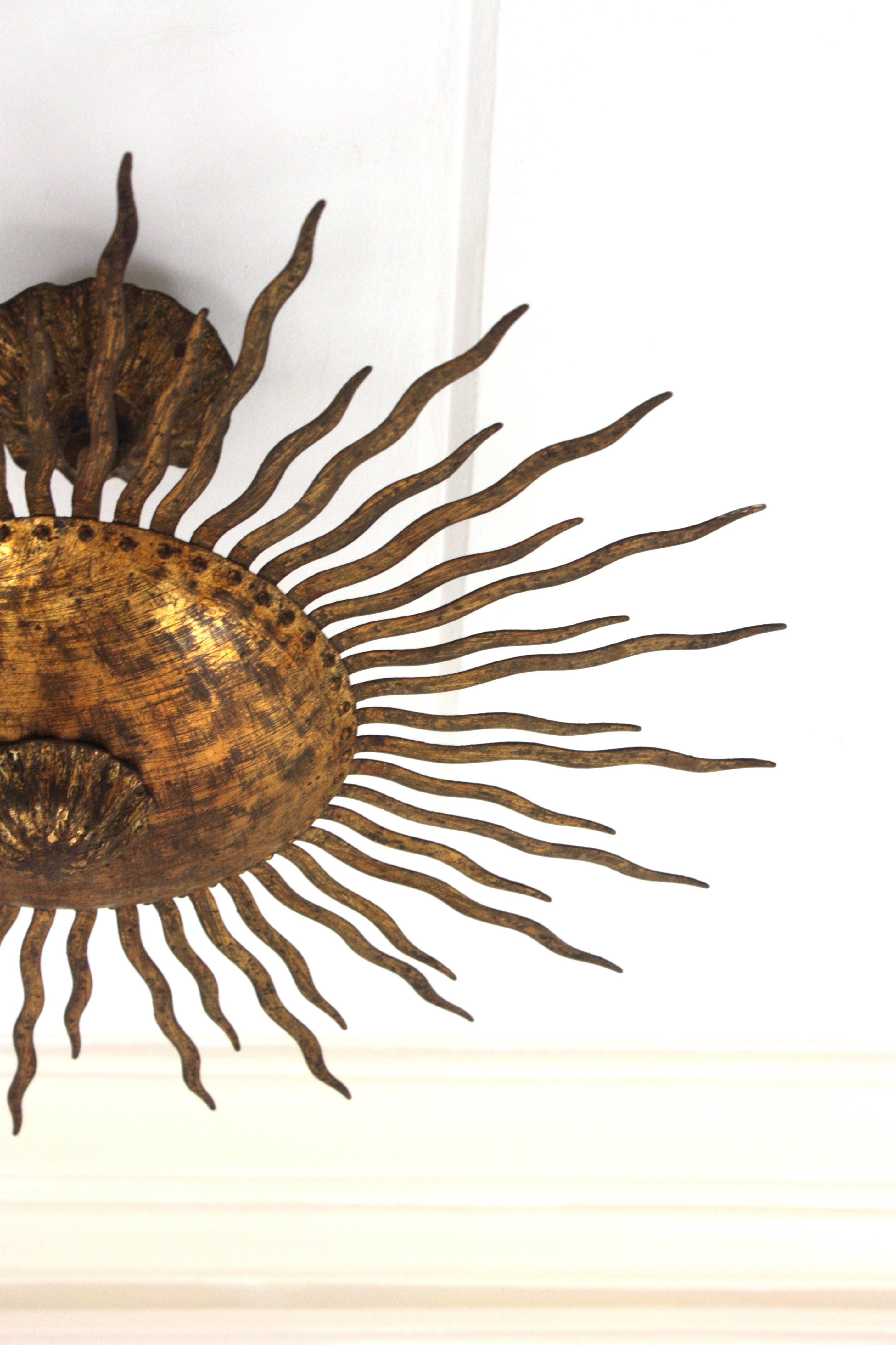Sunburst Ceiling Light Fixture or Chandelier with Curly Rays, Gilt Iron For Sale 4