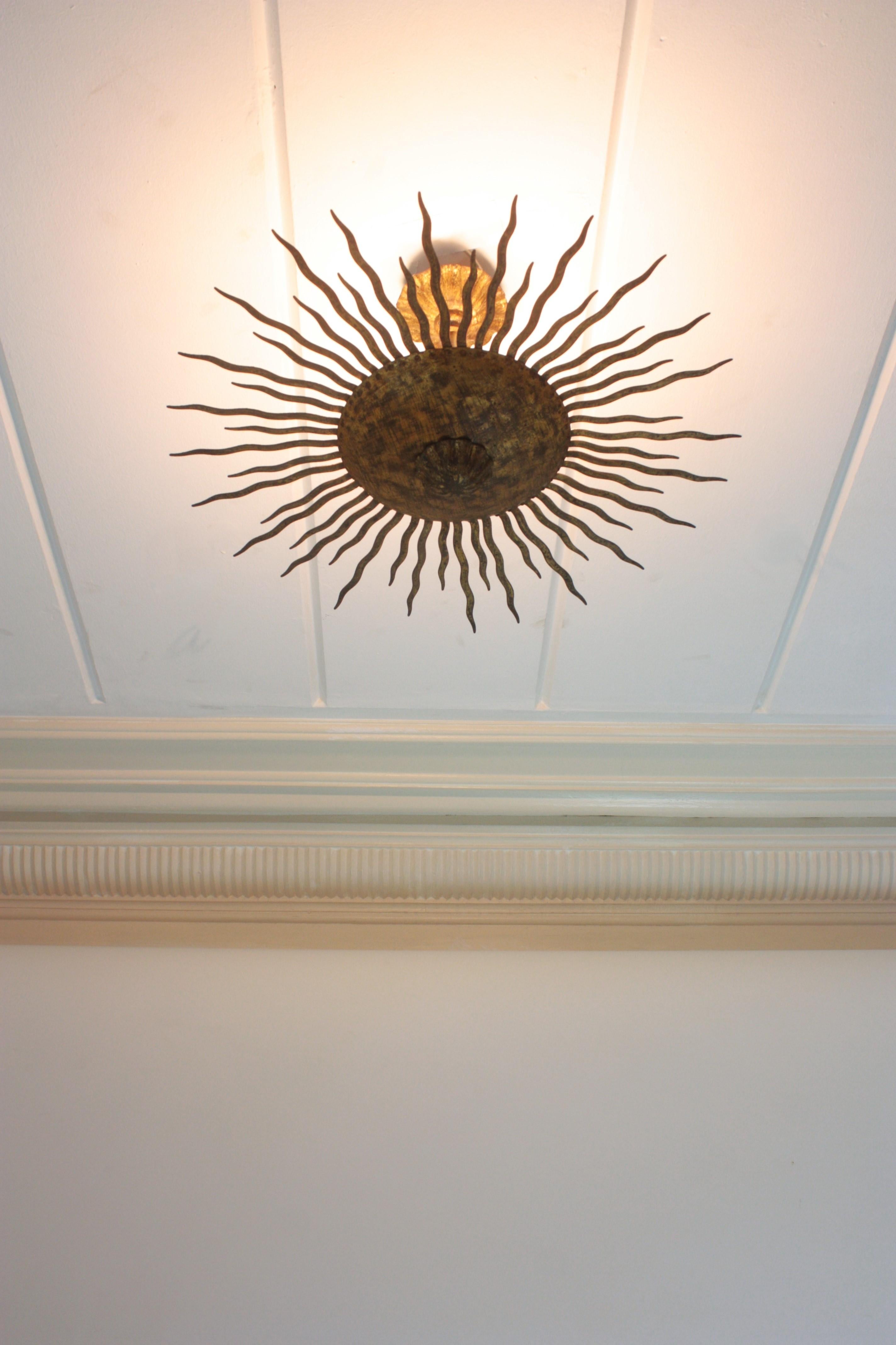 Sunburst Ceiling Light Fixture or Chandelier with Curly Rays, Gilt Iron For Sale 5