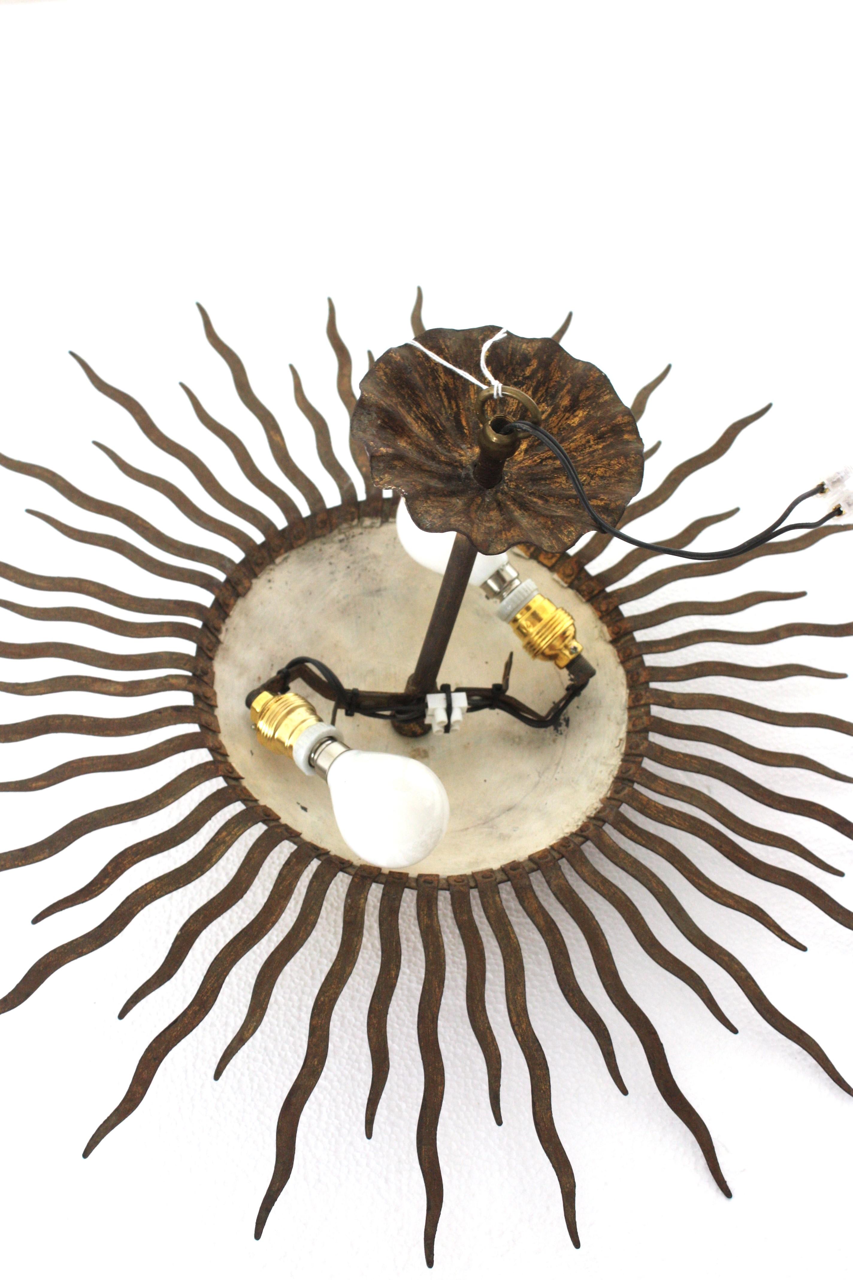 Sunburst Ceiling Light Fixture or Chandelier with Curly Rays, Gilt Iron For Sale 10