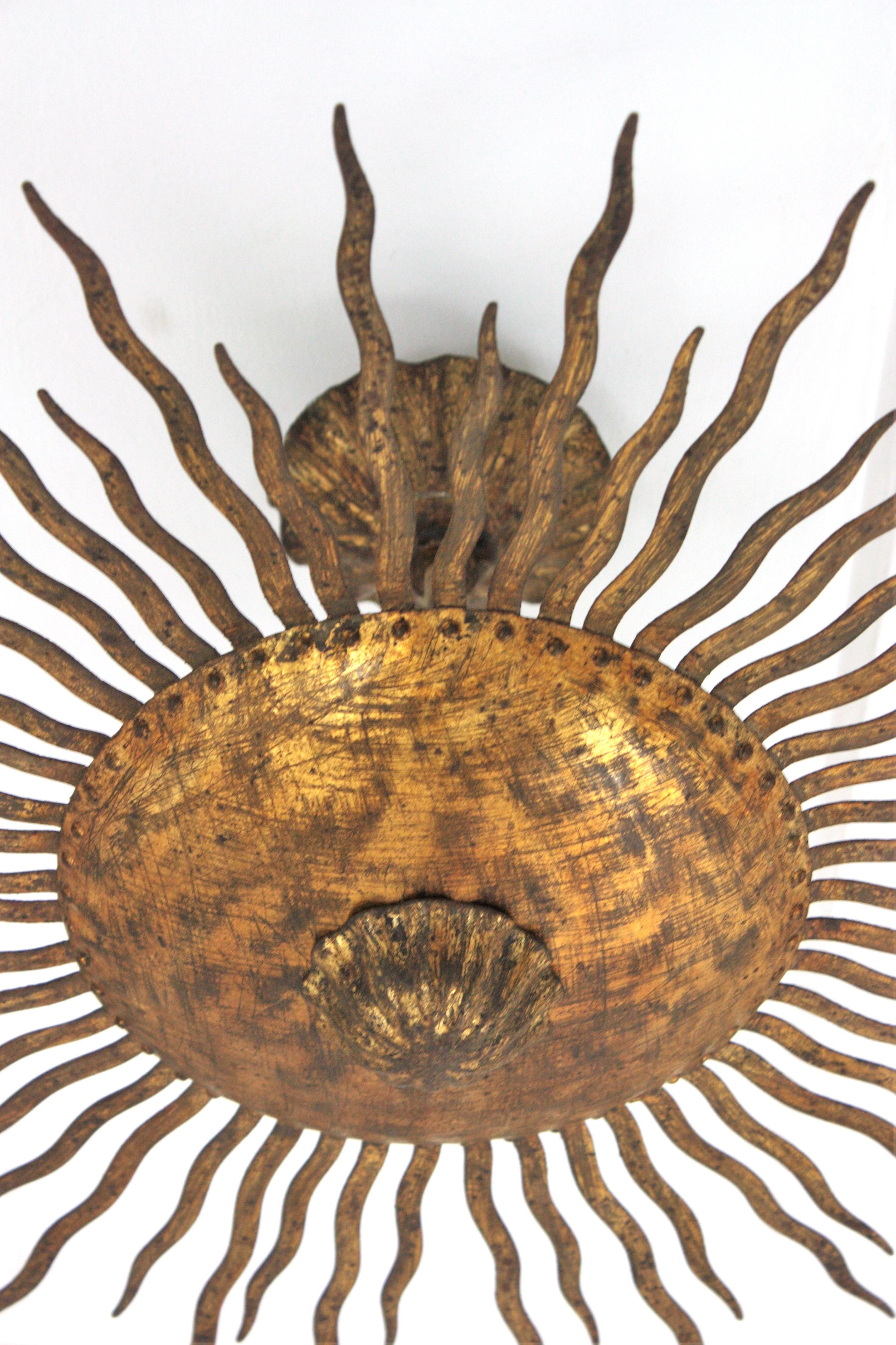 20th Century Sunburst Ceiling Light Fixture or Chandelier with Curly Rays, Gilt Iron For Sale